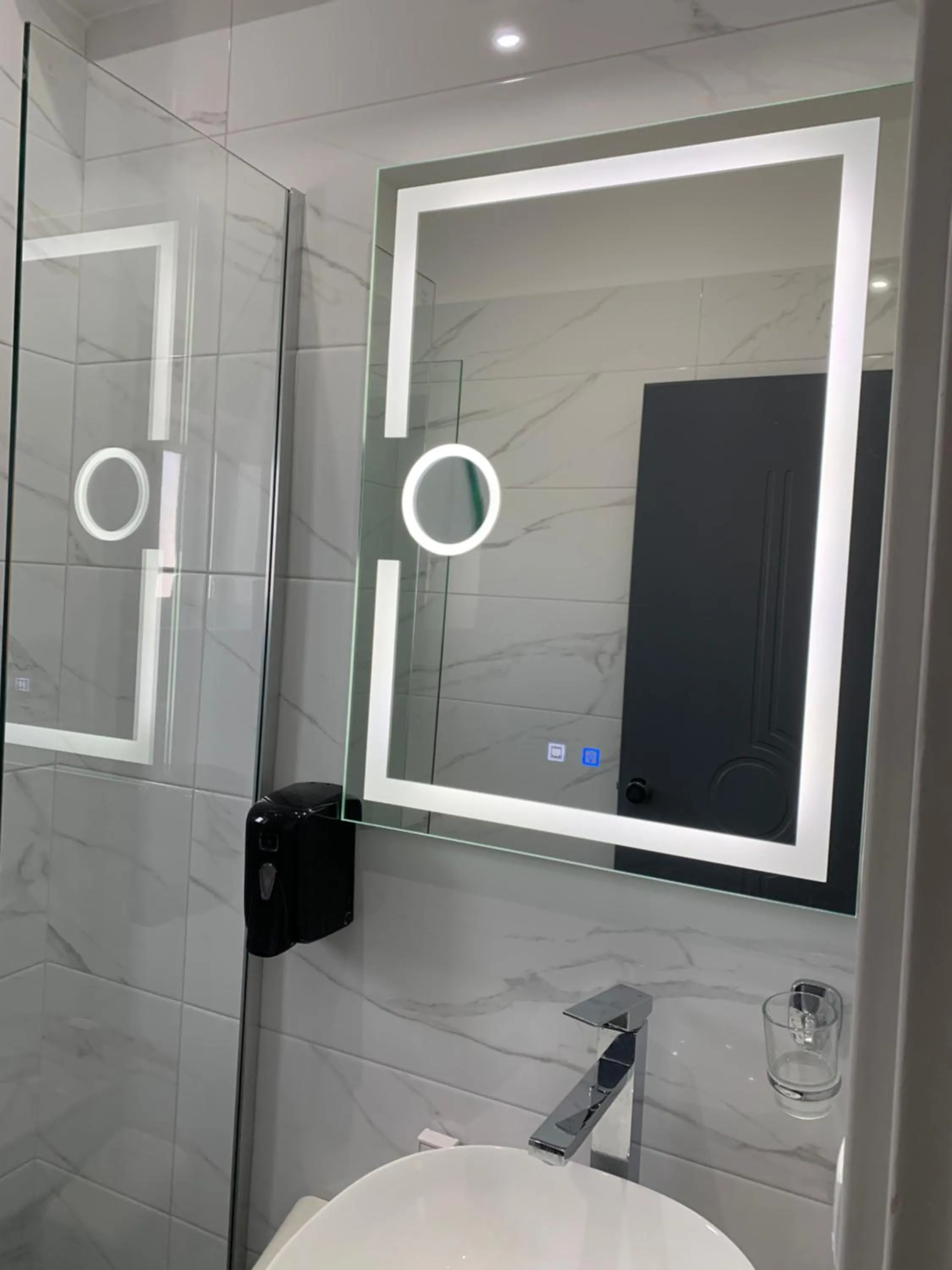 Bathroom in Perea Hotel