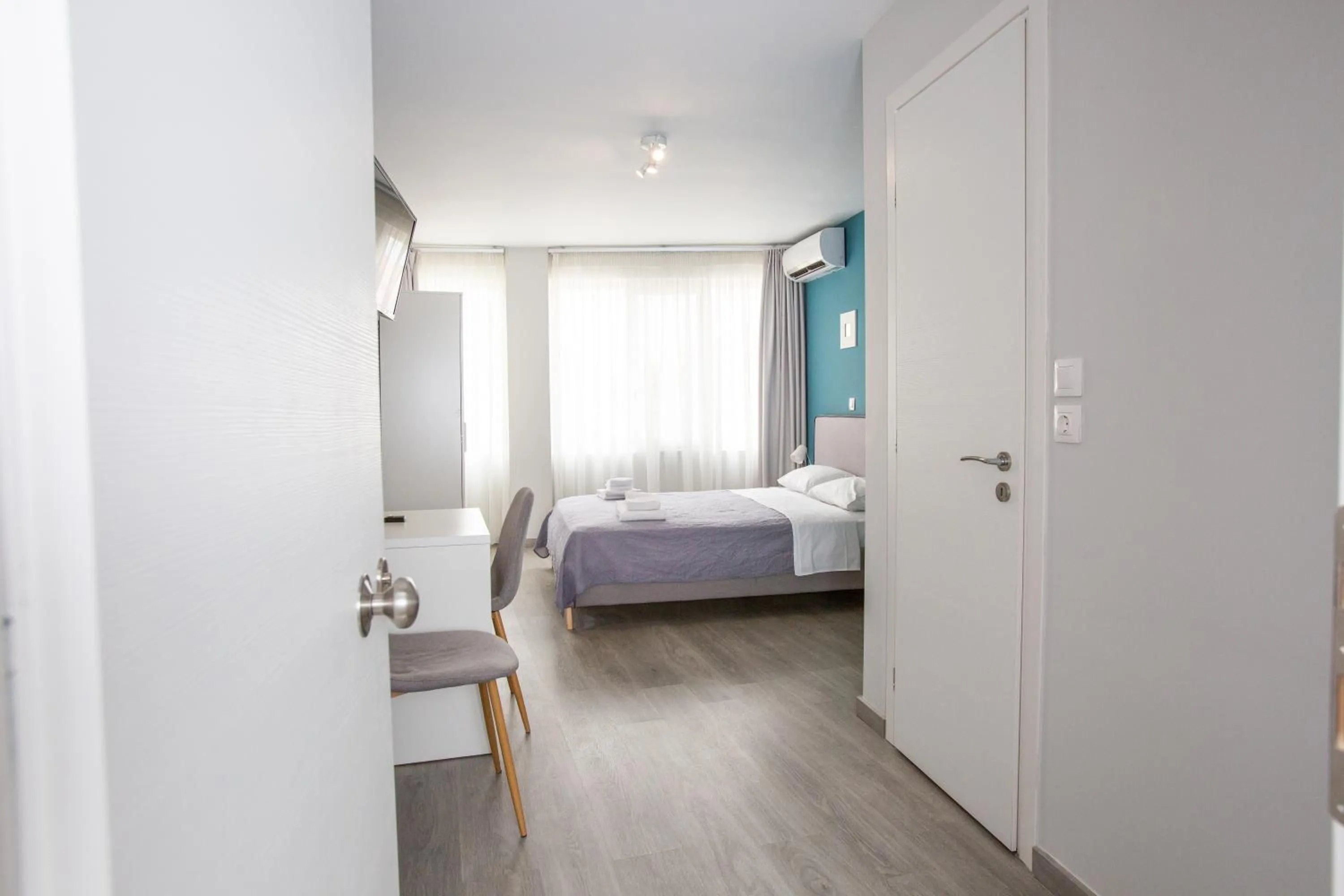 Bed in Raise Boutique Rooms in the Center of Athens