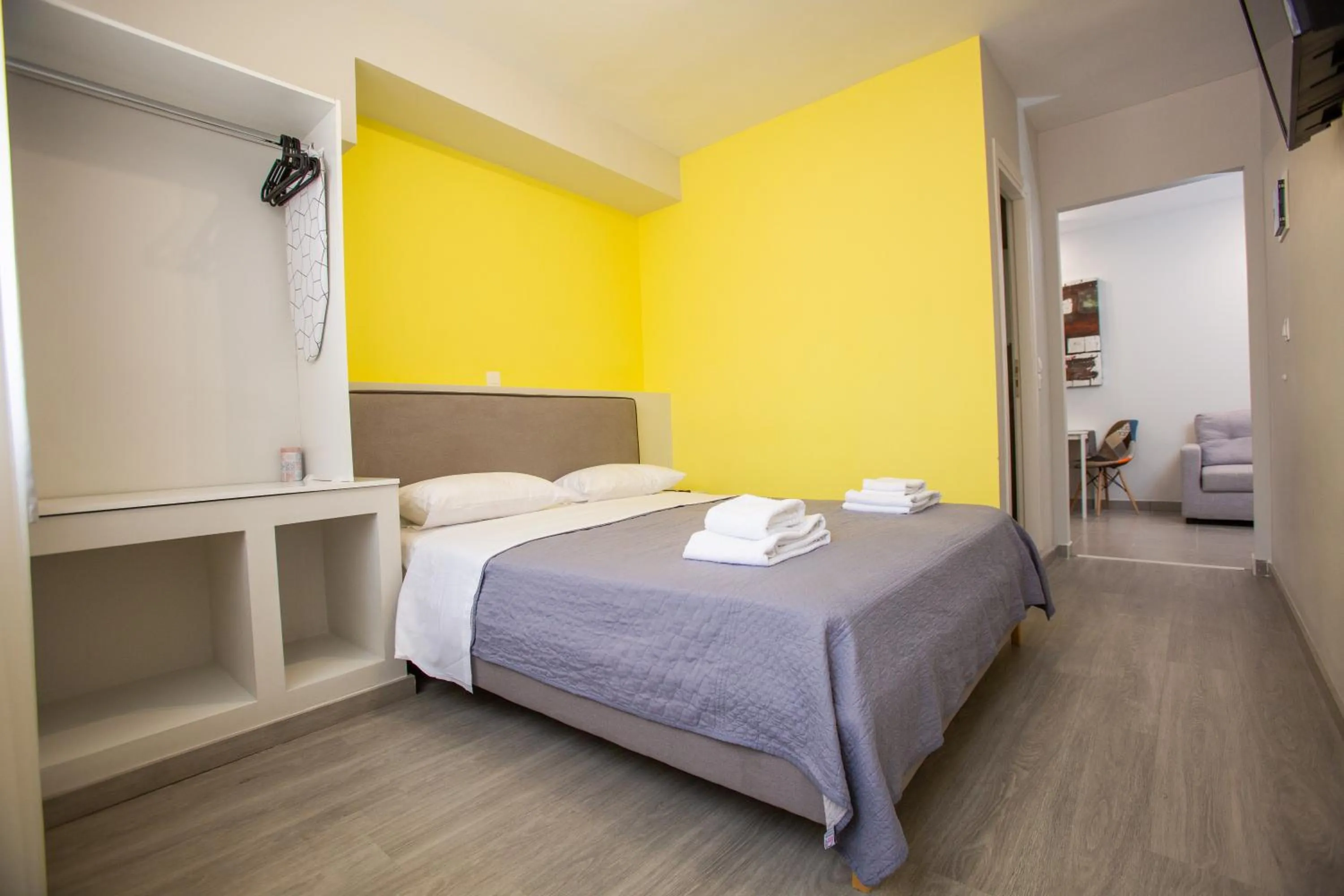Bed in Raise Boutique Rooms in the Center of Athens