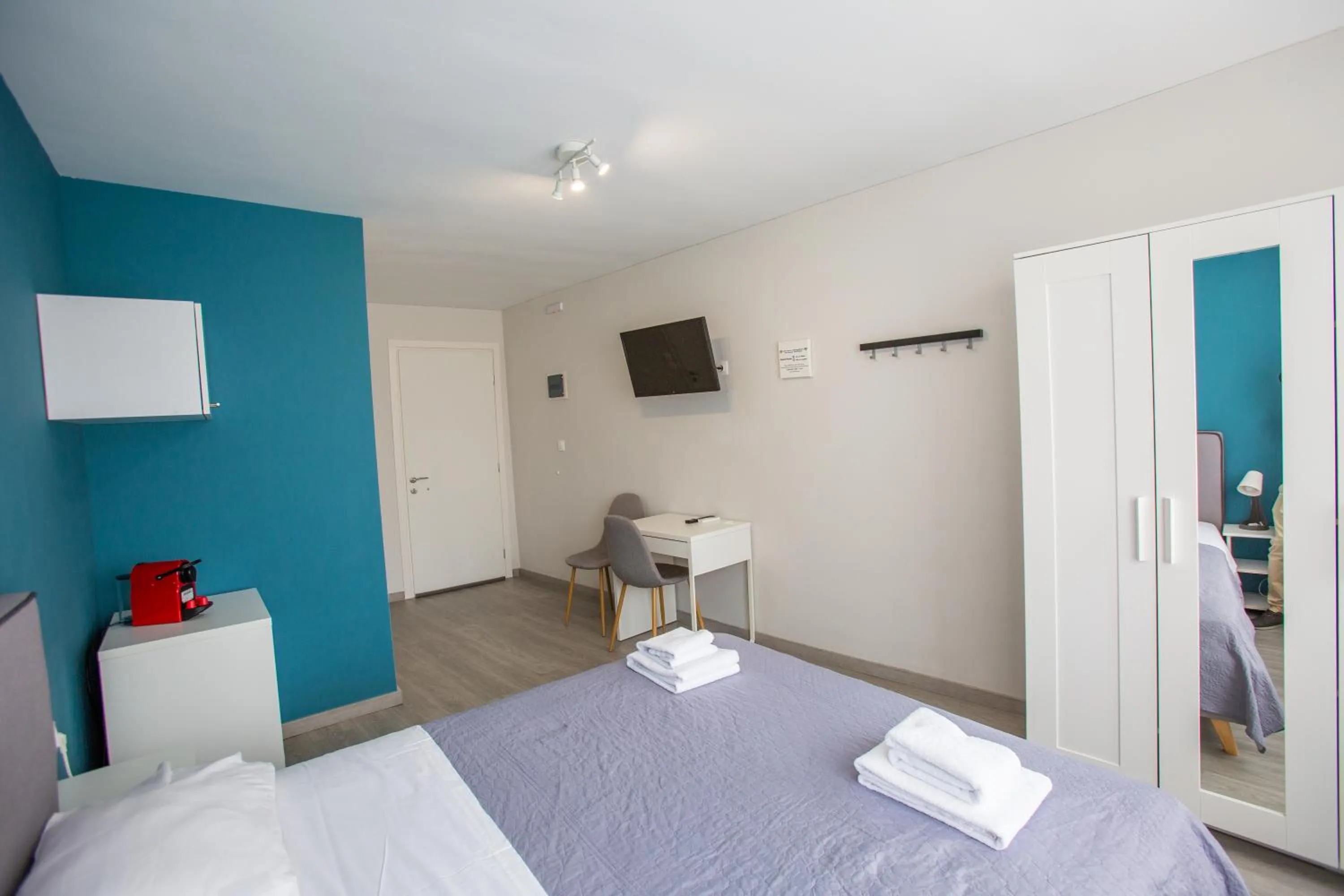 Bed in Raise Boutique Rooms in the Center of Athens