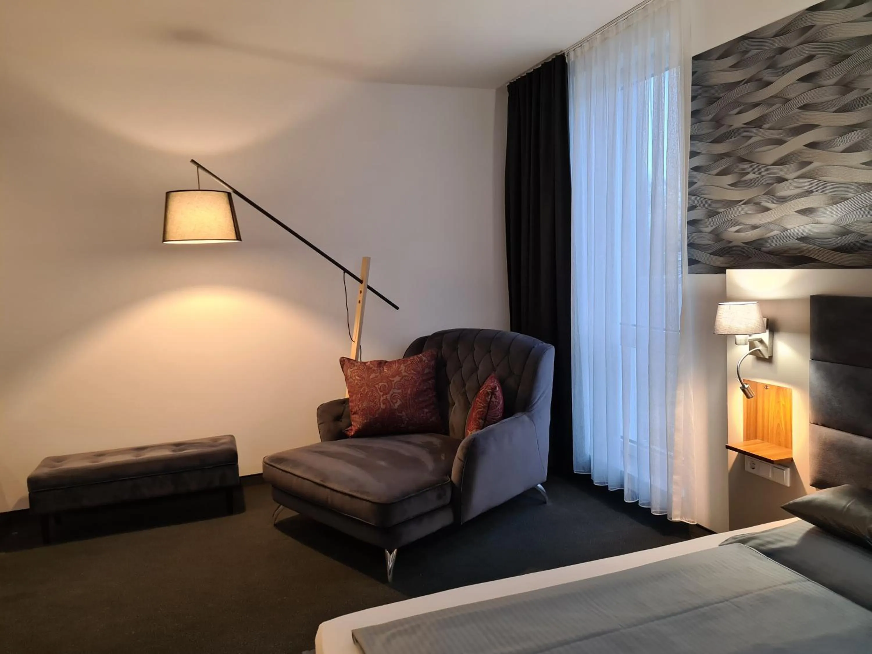 Photo of the whole room, Bed in Hotel Starton am Ingolstadt Village