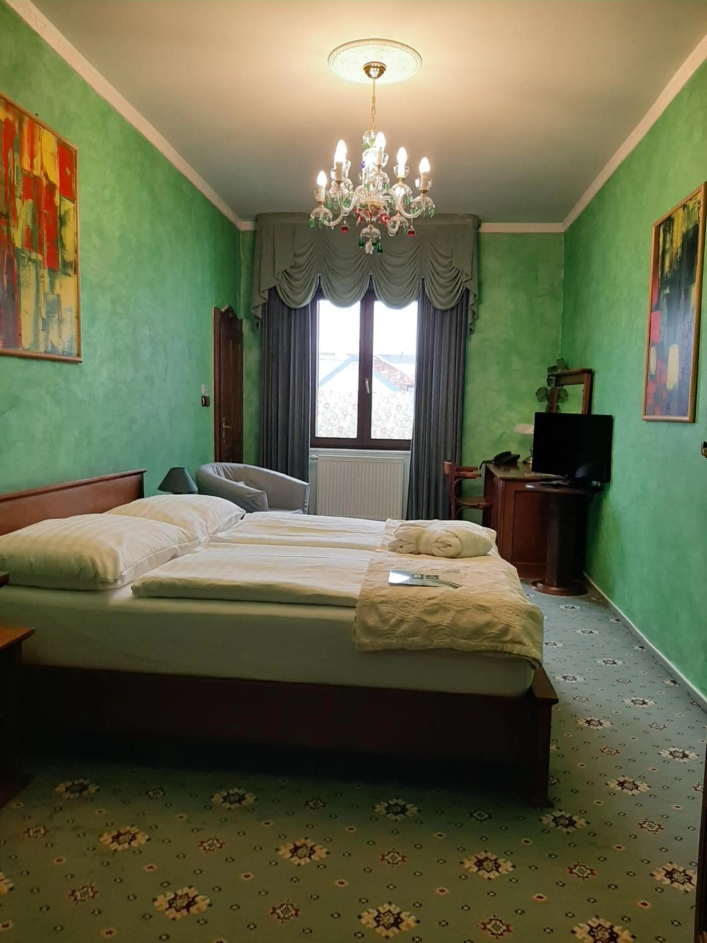 Bed in Brioni Suites