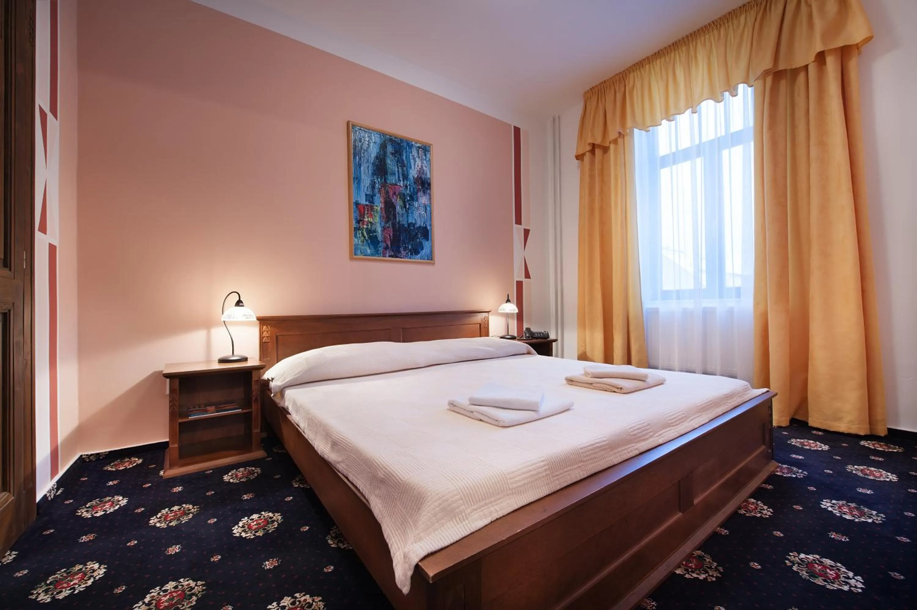 Bed in Brioni Suites