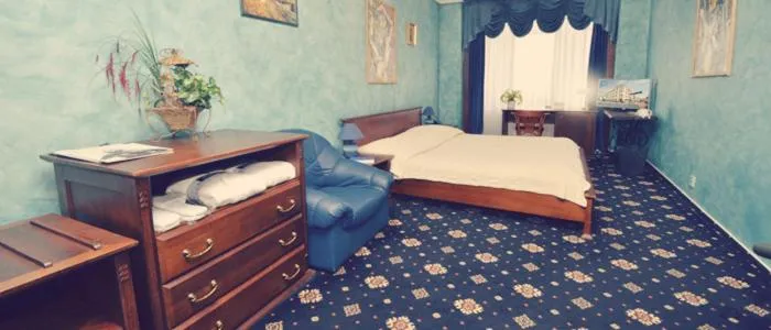 Bed in Brioni Suites