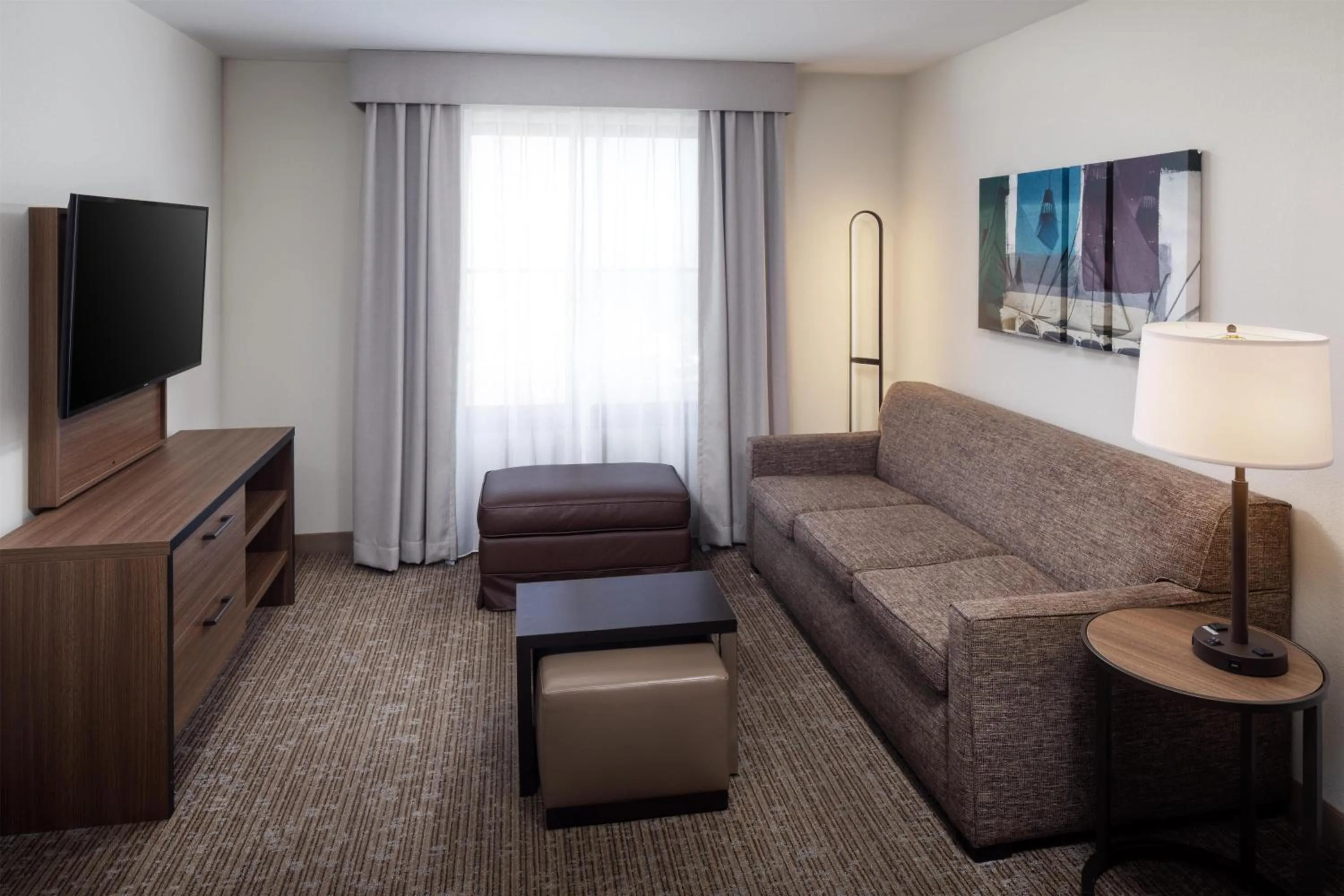 Living room in Homewood Suites by Hilton Denver International Airport