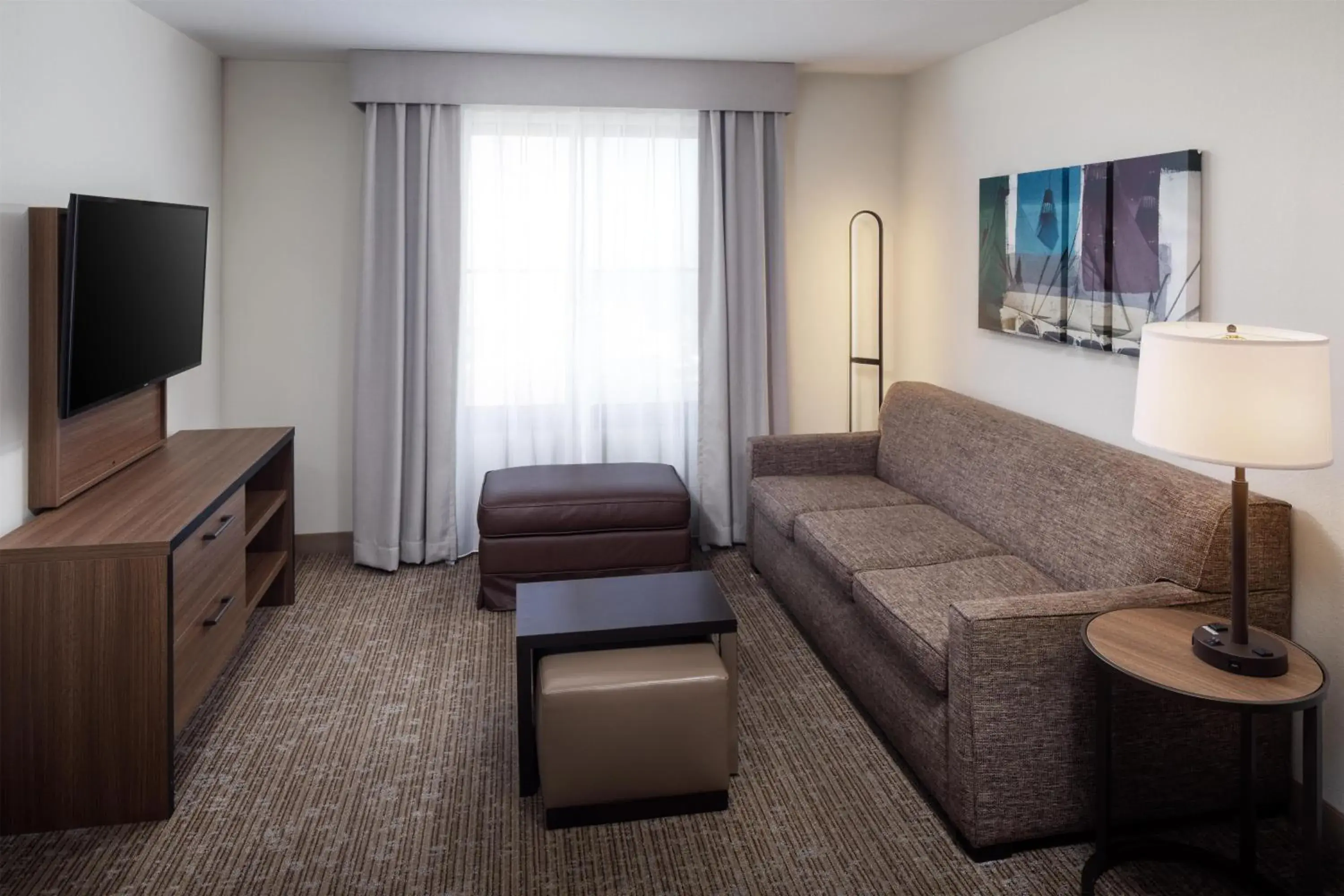 Living room in Homewood Suites by Hilton Denver International Airport Living room in Homewood Suites by Hilton Denver International Airport