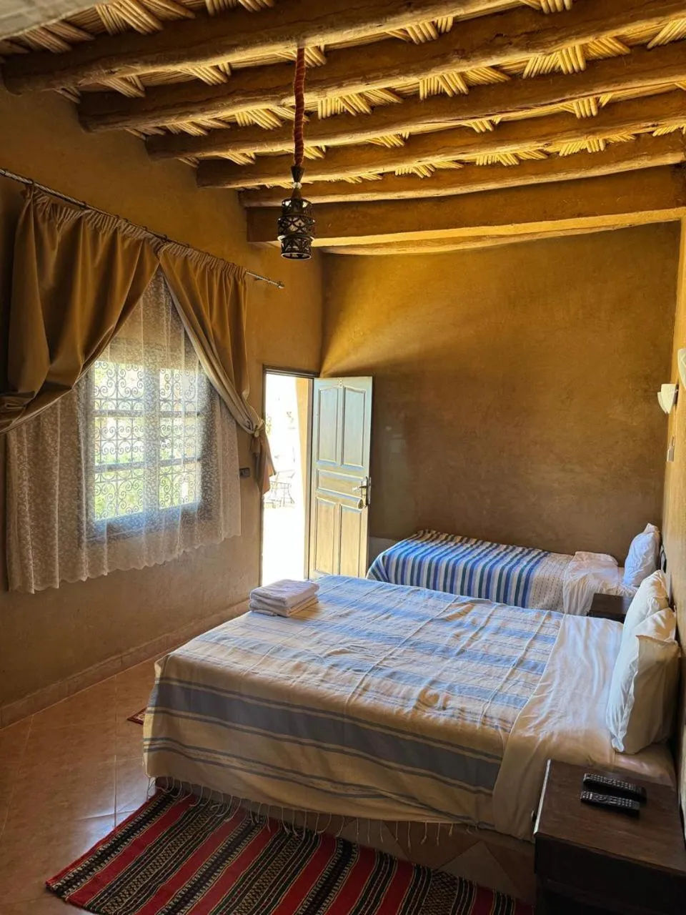 Photo of the whole room, Bed in Kasbah Ait BenHadda