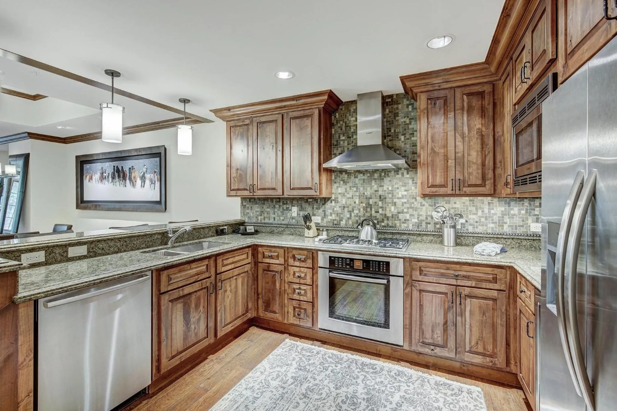 Communal kitchen in Legendary Lodging at the Ritz Carlton Residences Vail, A Vail Resorts Property