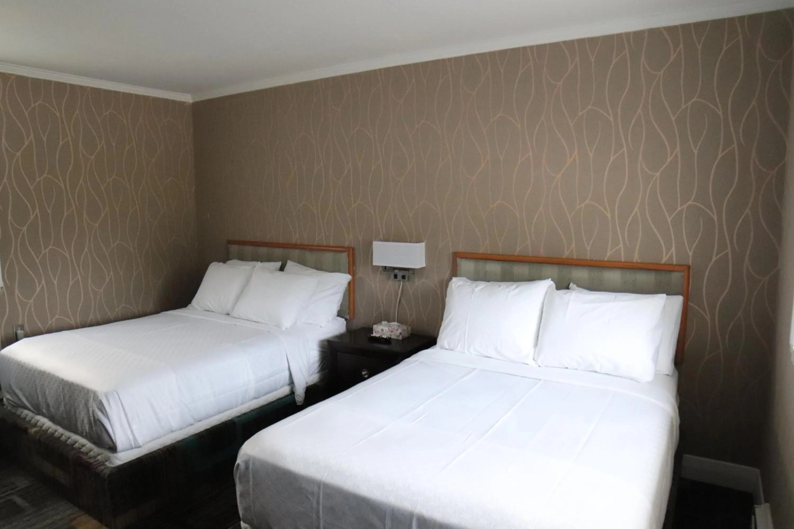 Bed in Walkerton Inn Motel