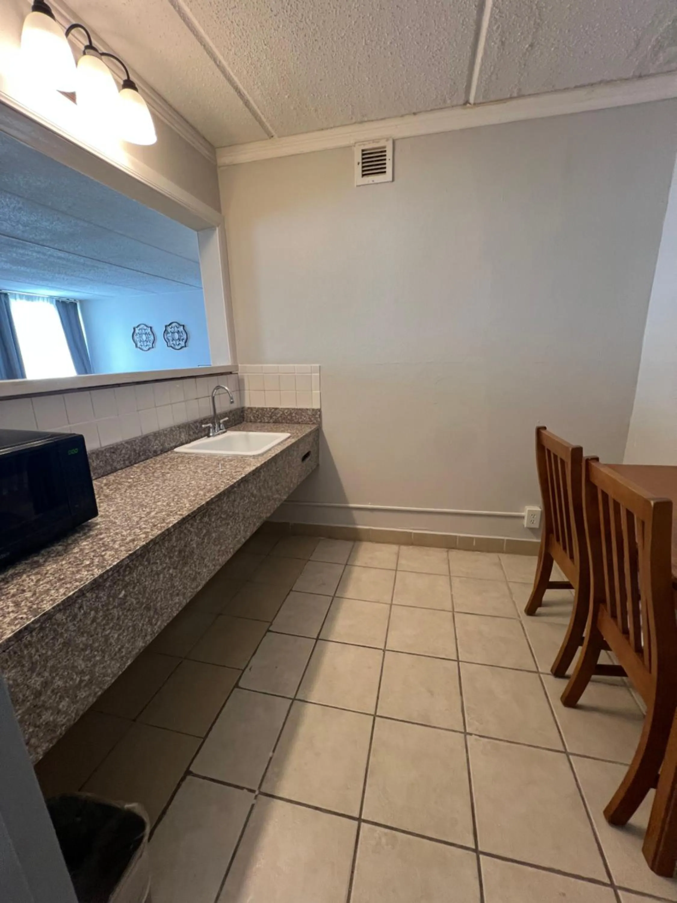 Kitchen or kitchenette in The Grand Hotel Spindletop