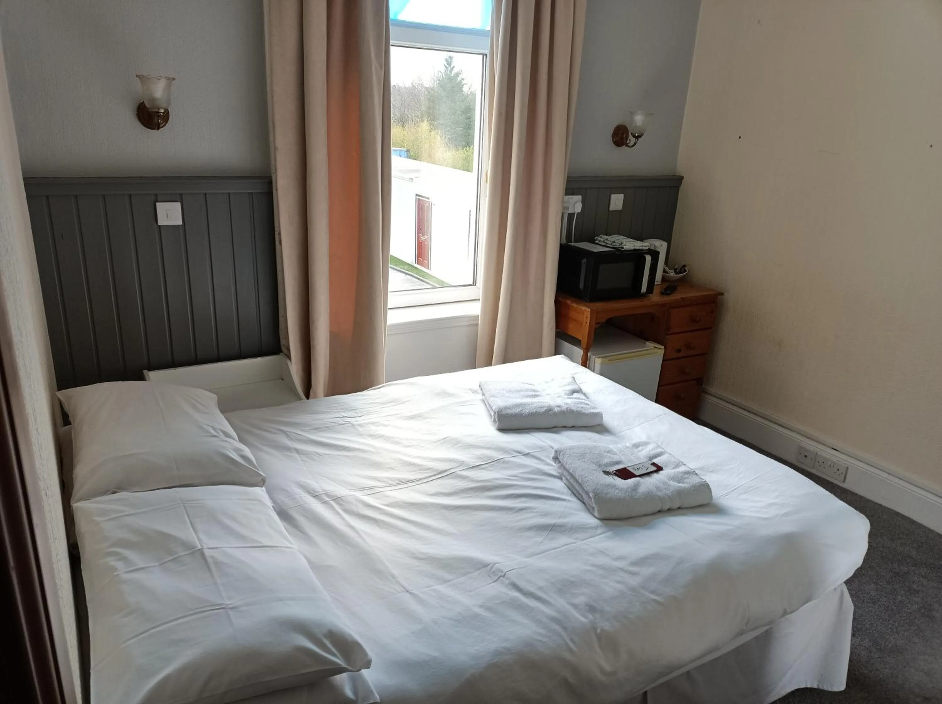 Bed in The Townhouse Accommodation