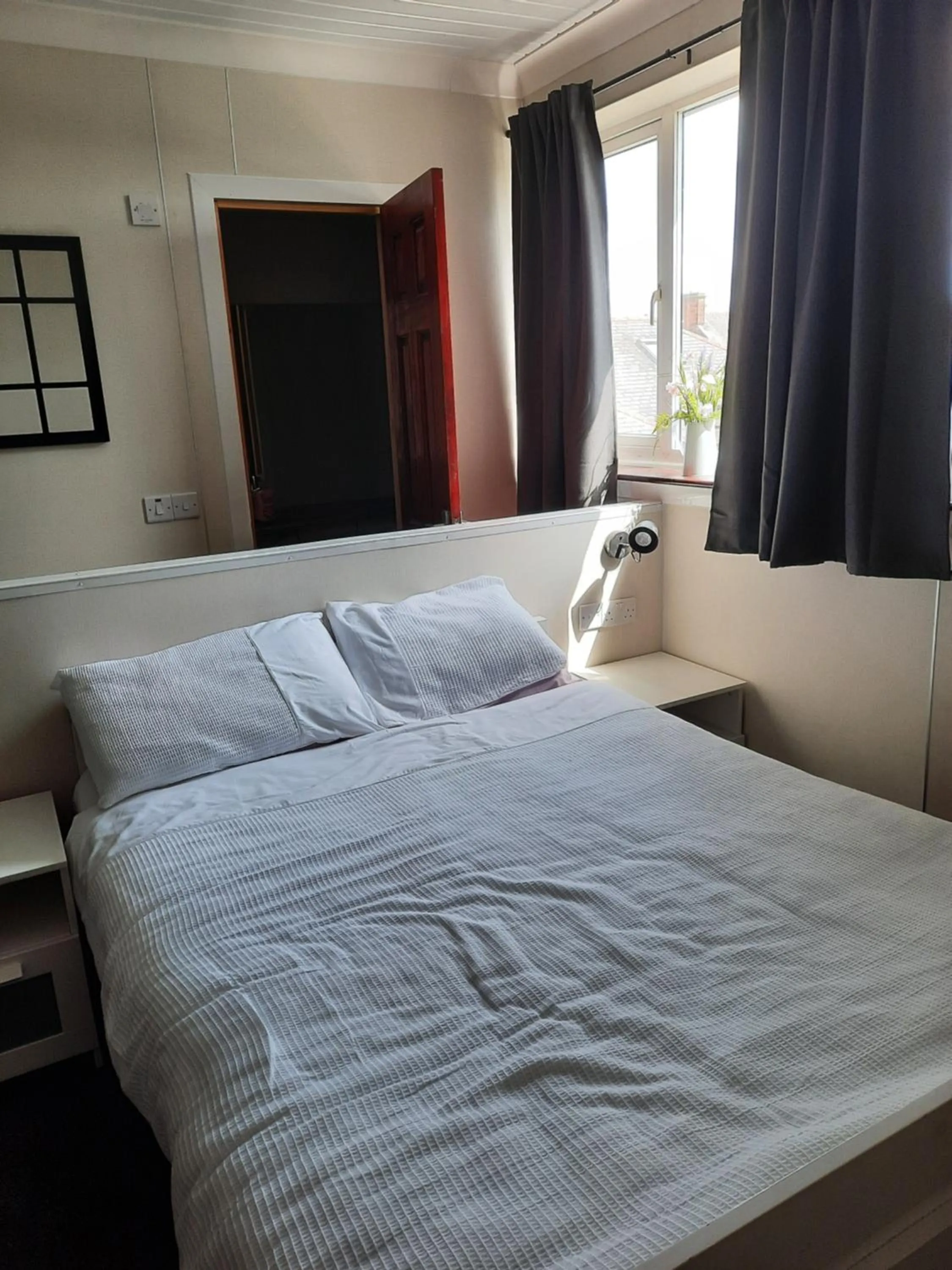 Bed in The Townhouse Accommodation