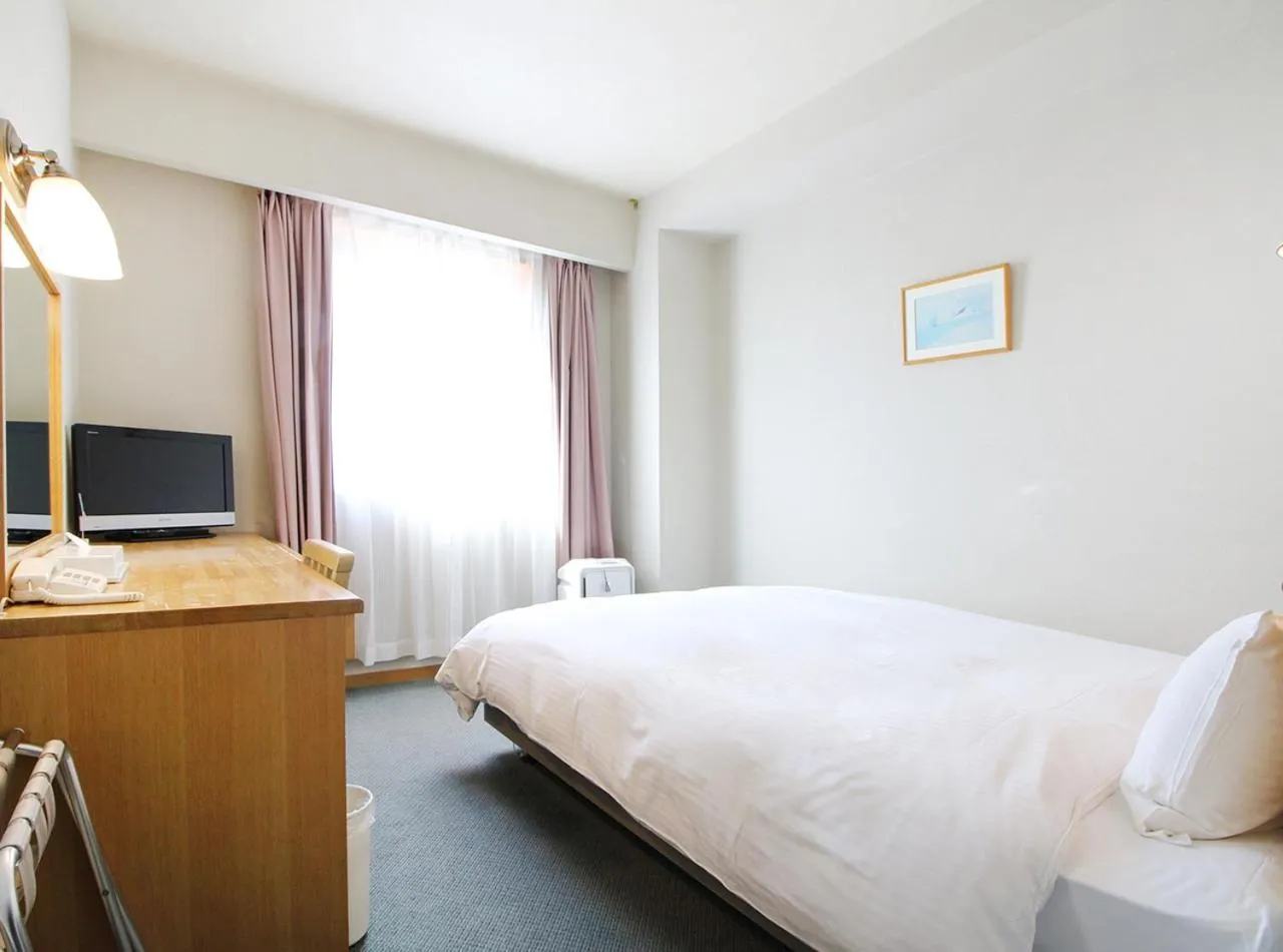 Photo of the whole room, Bed in Island Hotel