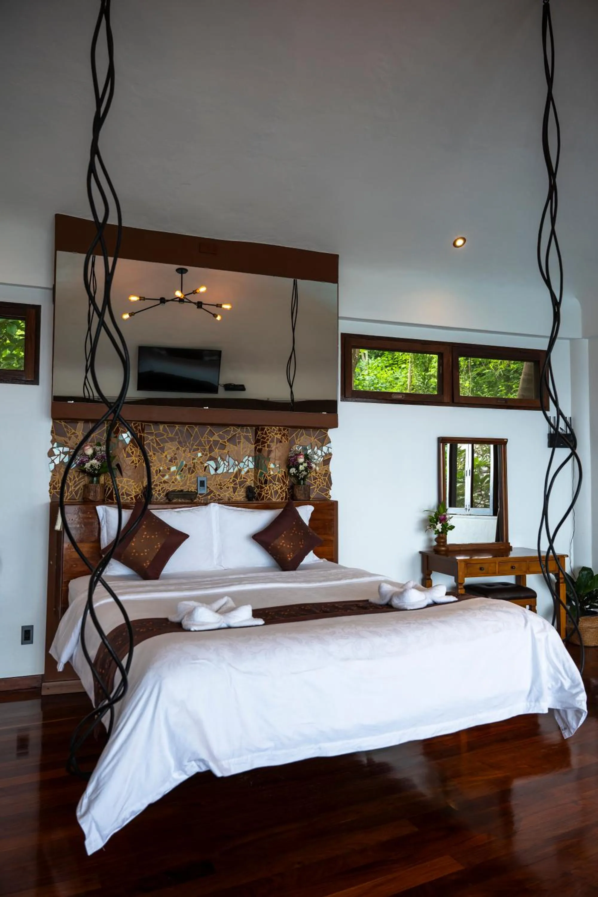Bed in Monkey Flower Villas