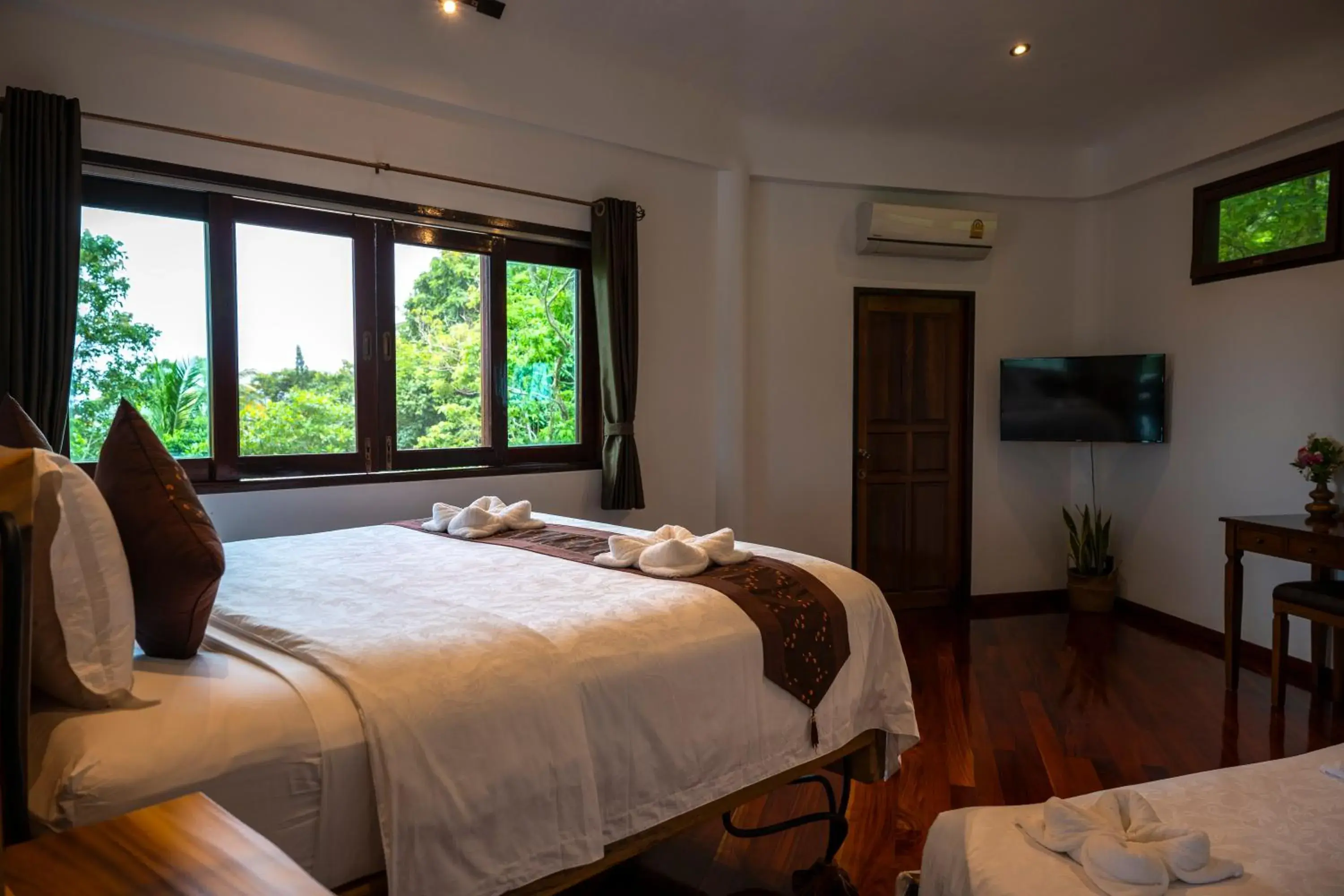 Bed in Monkey Flower Villas Bed in Monkey Flower Villas