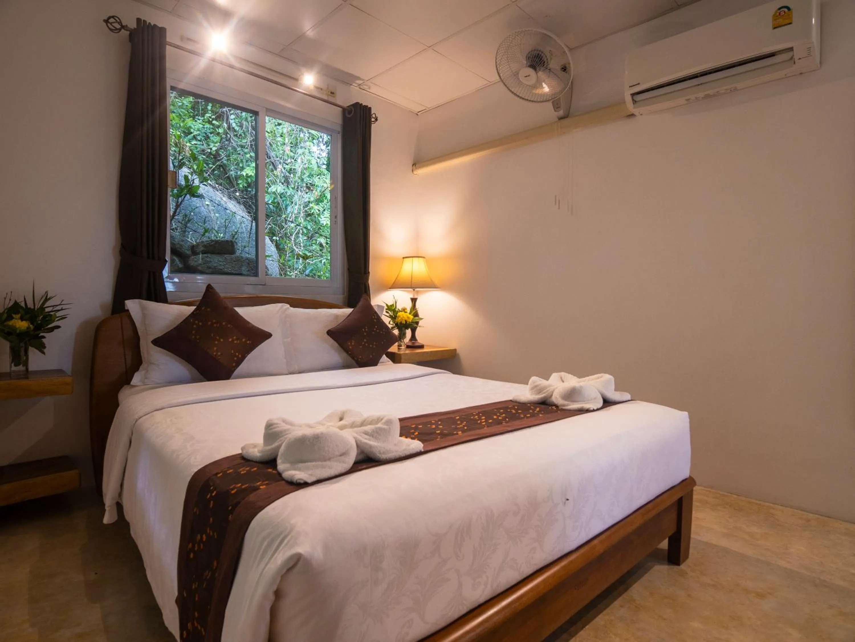 Bed in Monkey Flower Villas