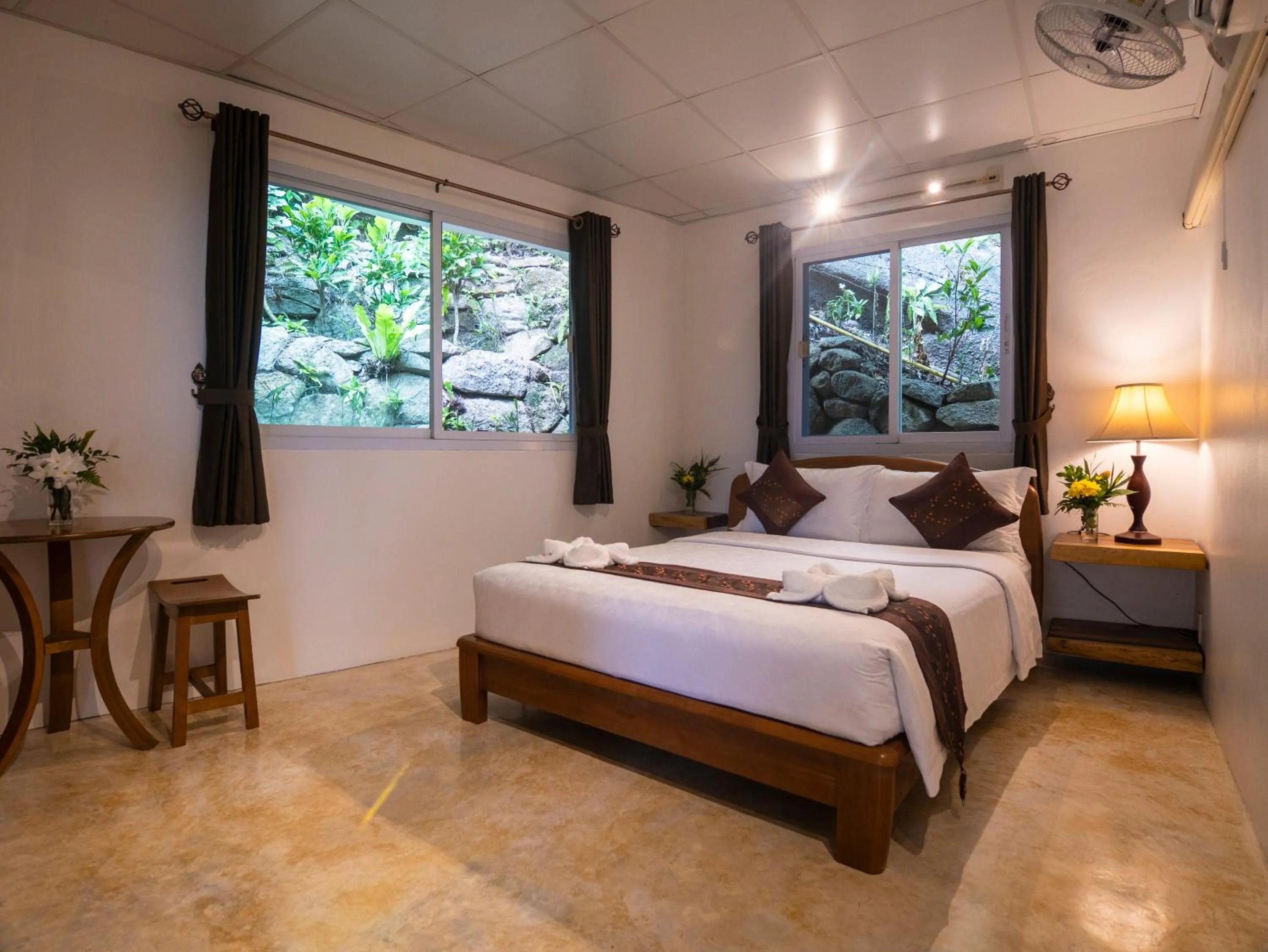 Bed in Monkey Flower Villas