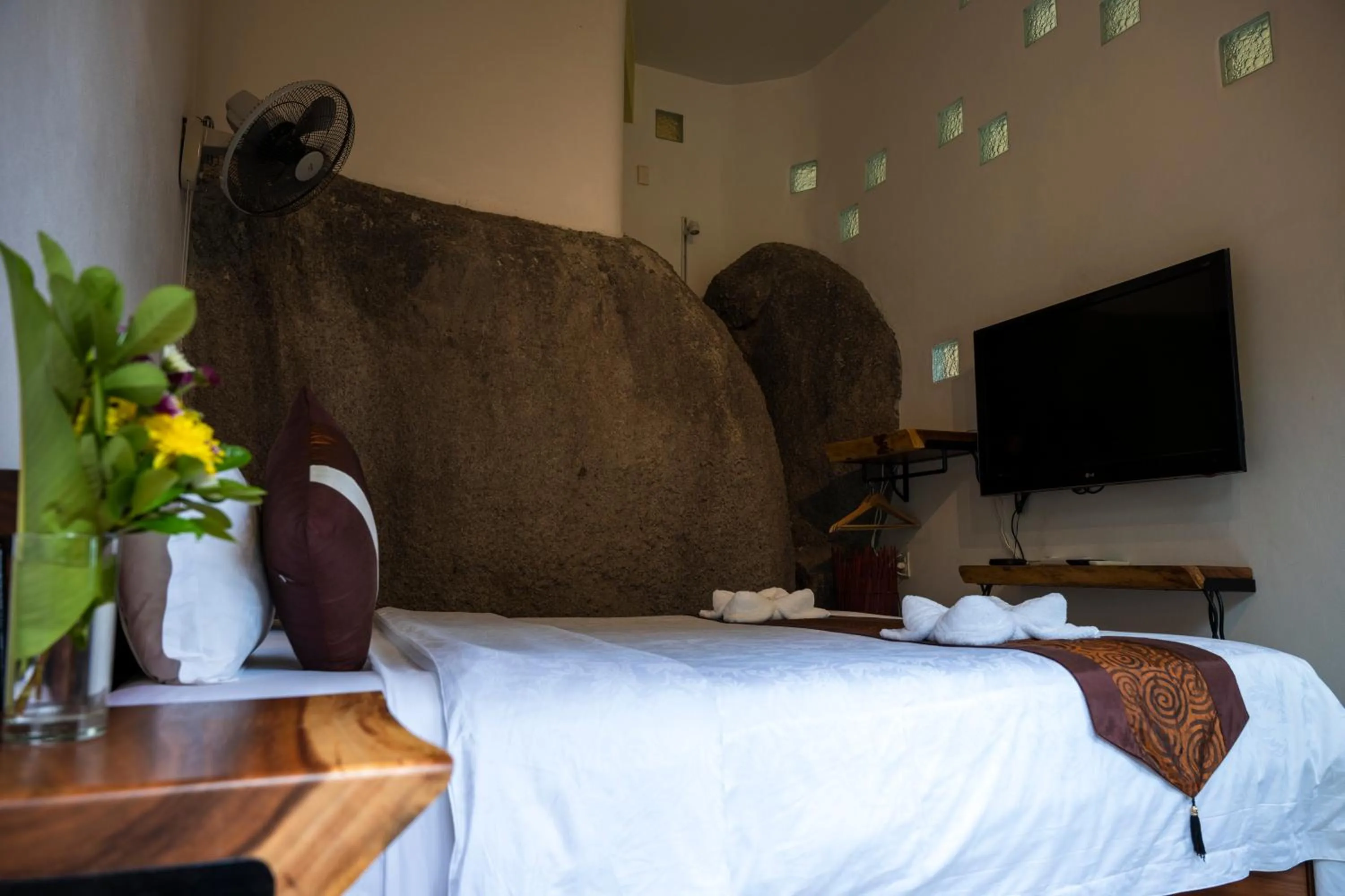 Bed in Monkey Flower Villas