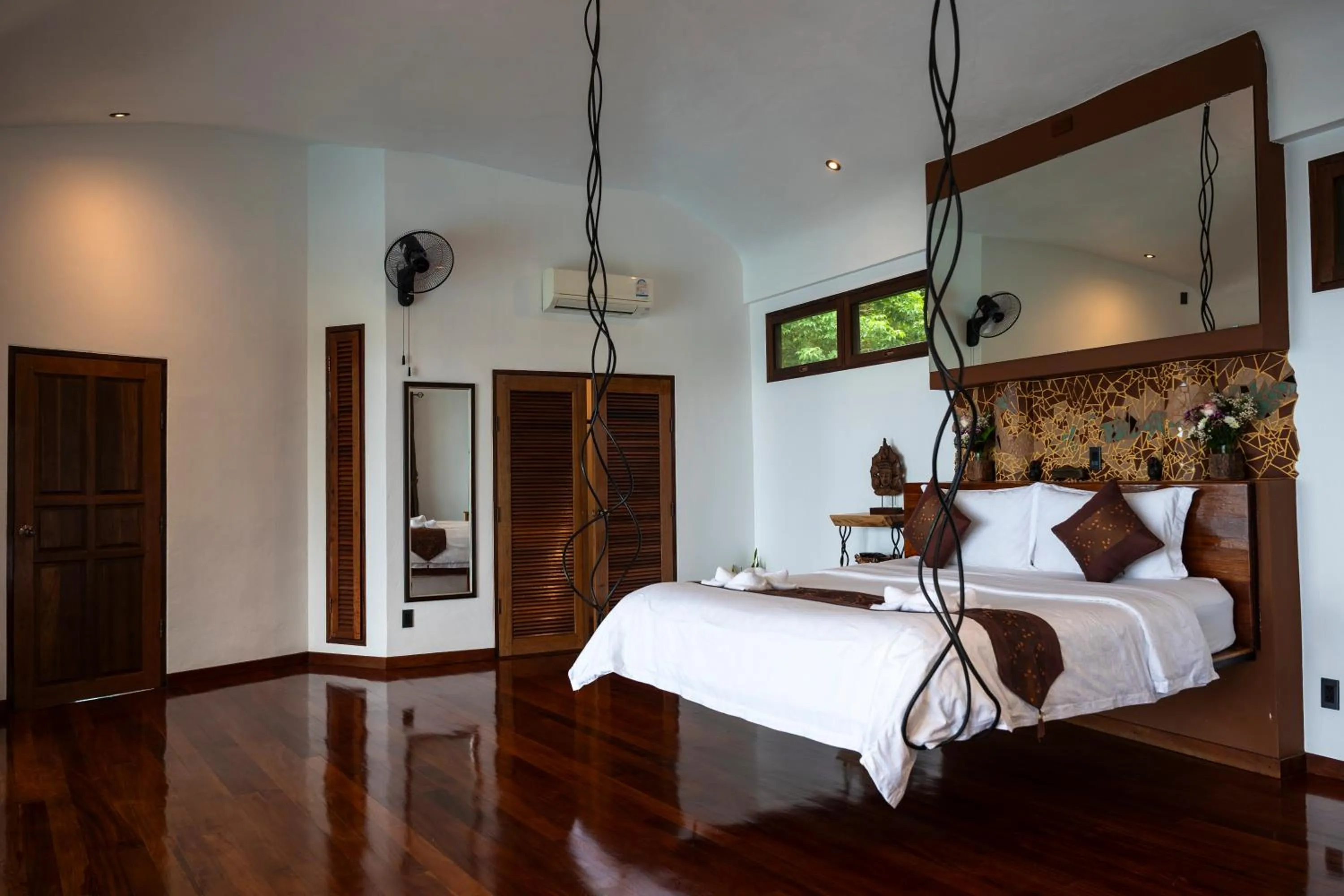 Bed in Monkey Flower Villas