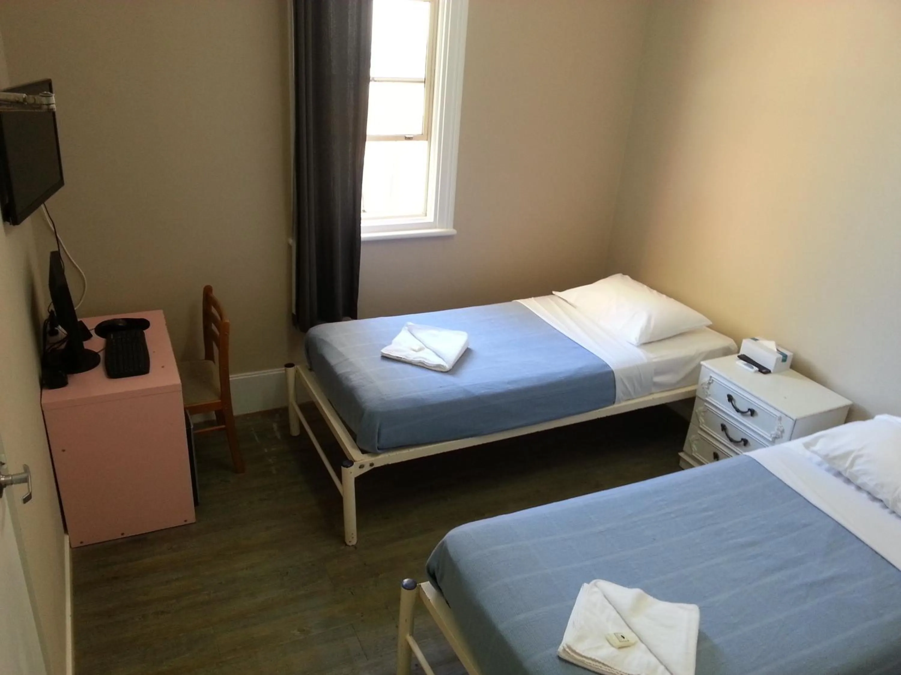 Bed in Central Private Hotel