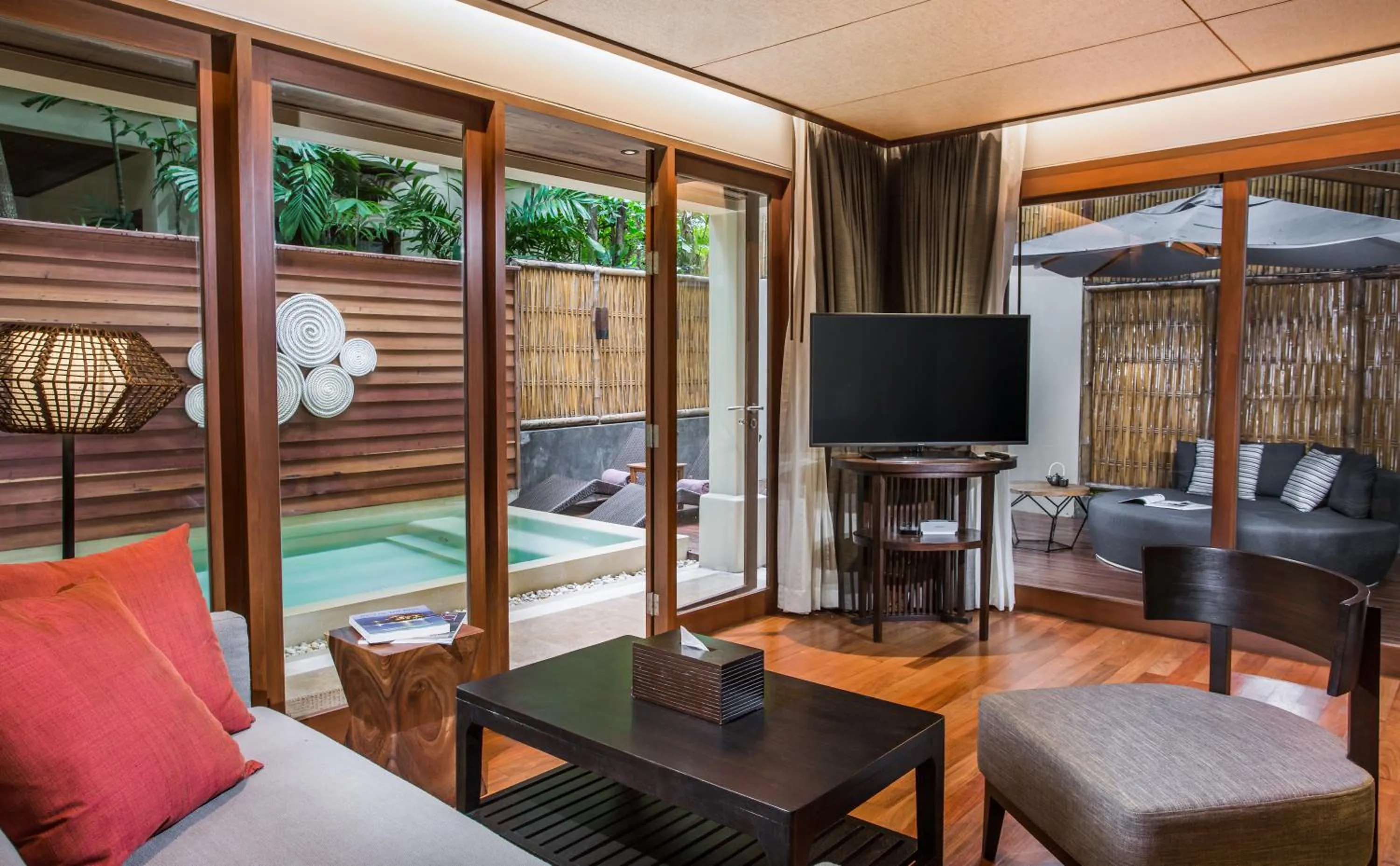 Communal lounge/ TV room in Anantara Rasananda Koh Phangan Villas