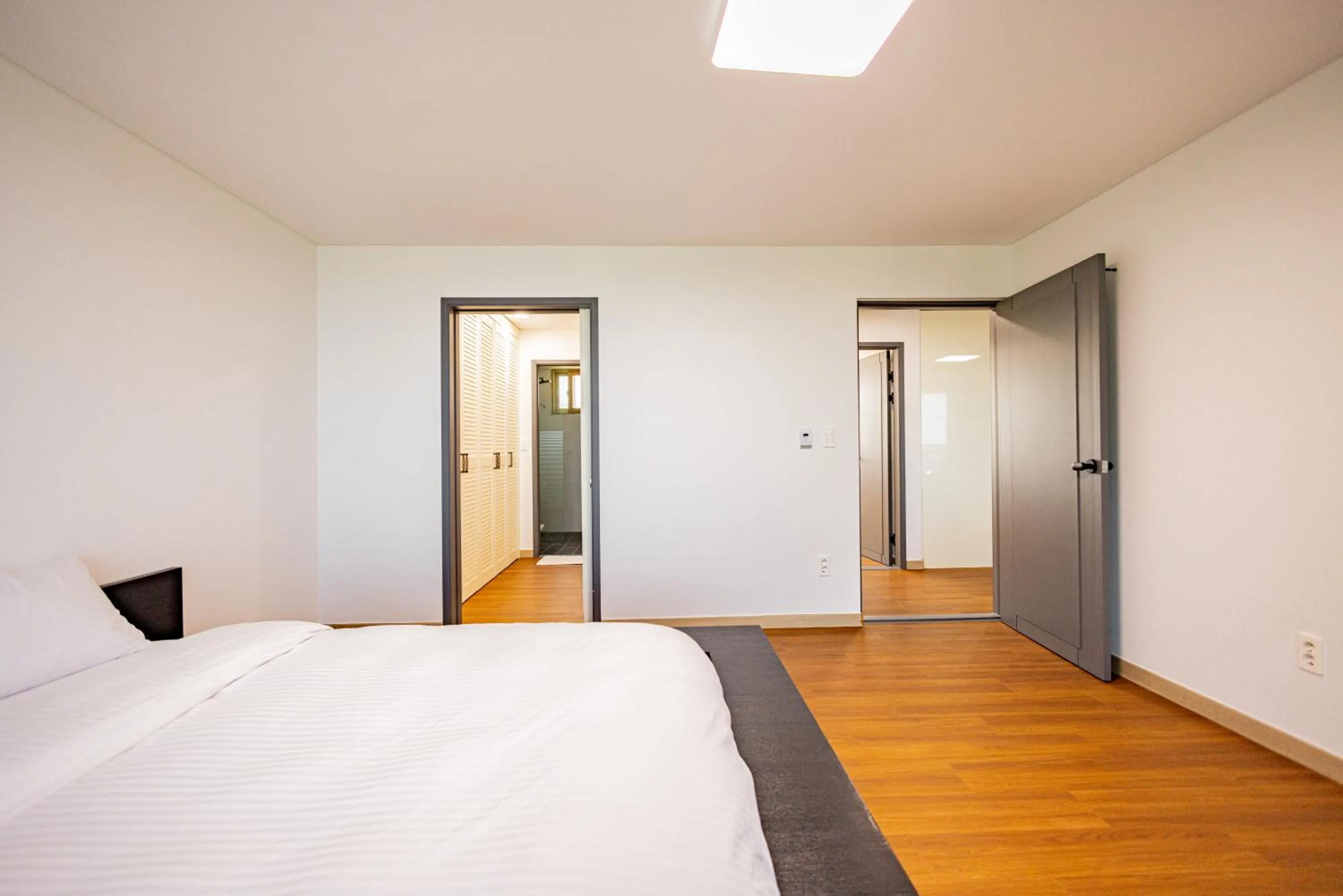 Bed in Jeju Arumdaun Resort