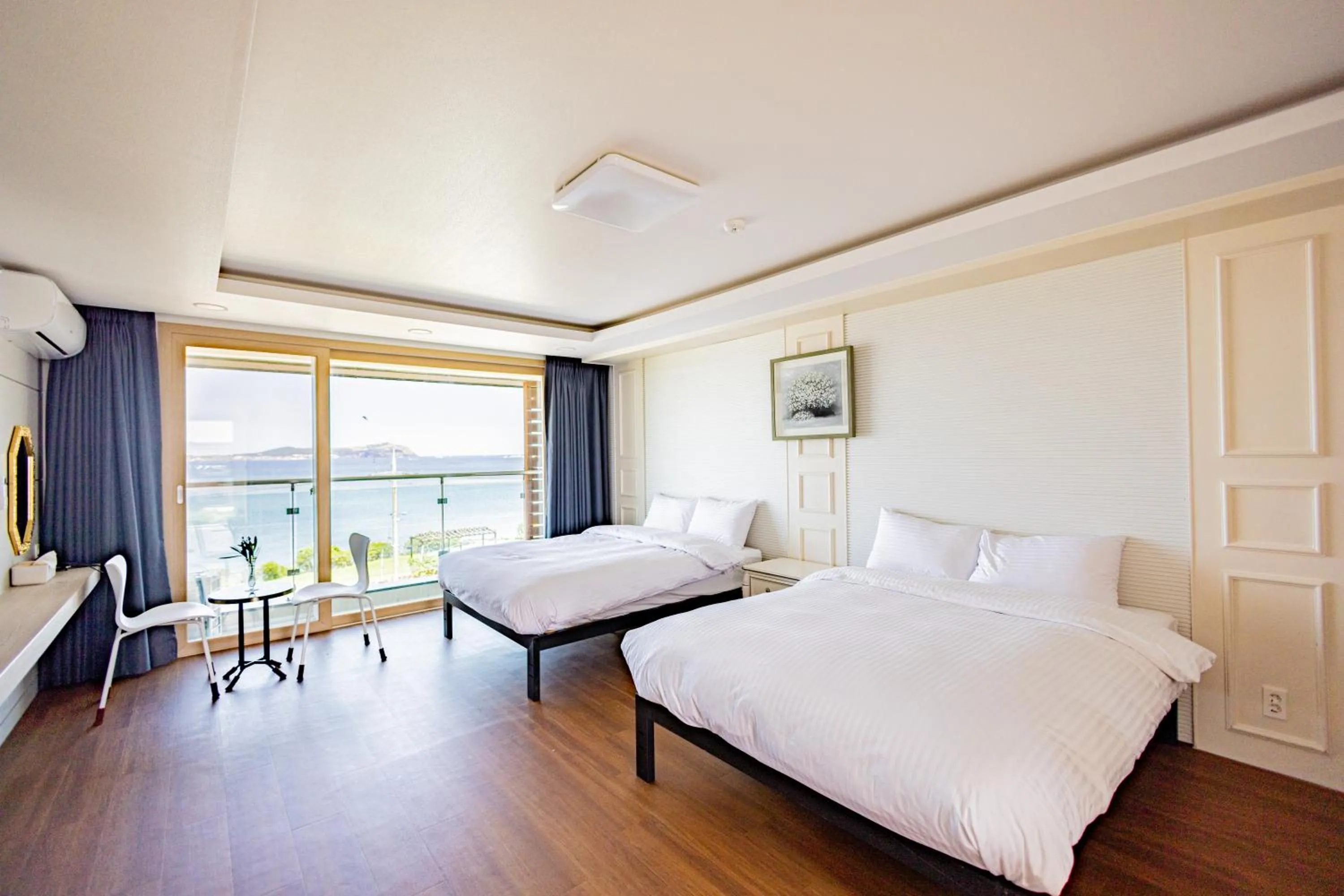 Bed in Jeju Arumdaun Resort