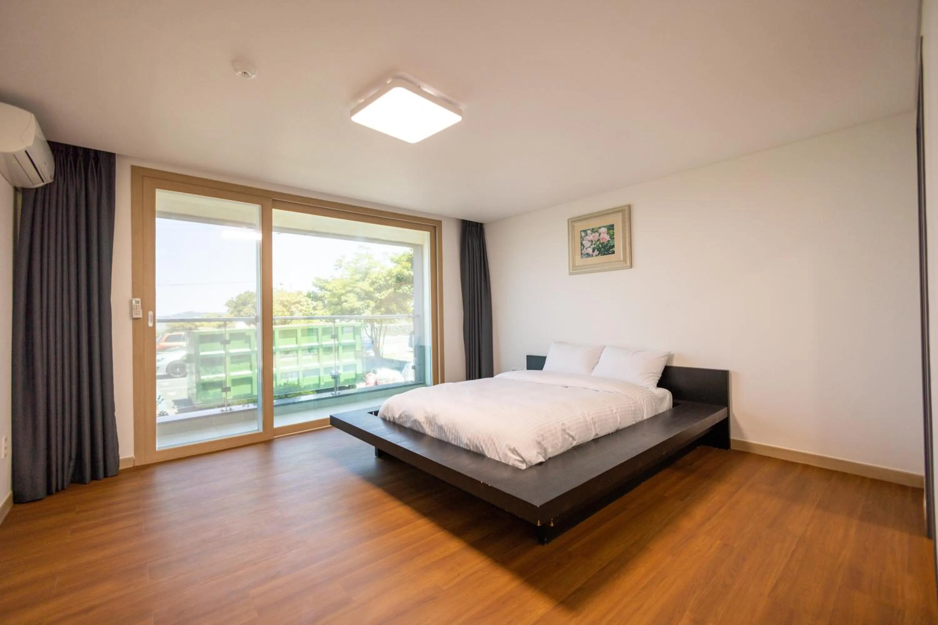 Bed in Jeju Arumdaun Resort