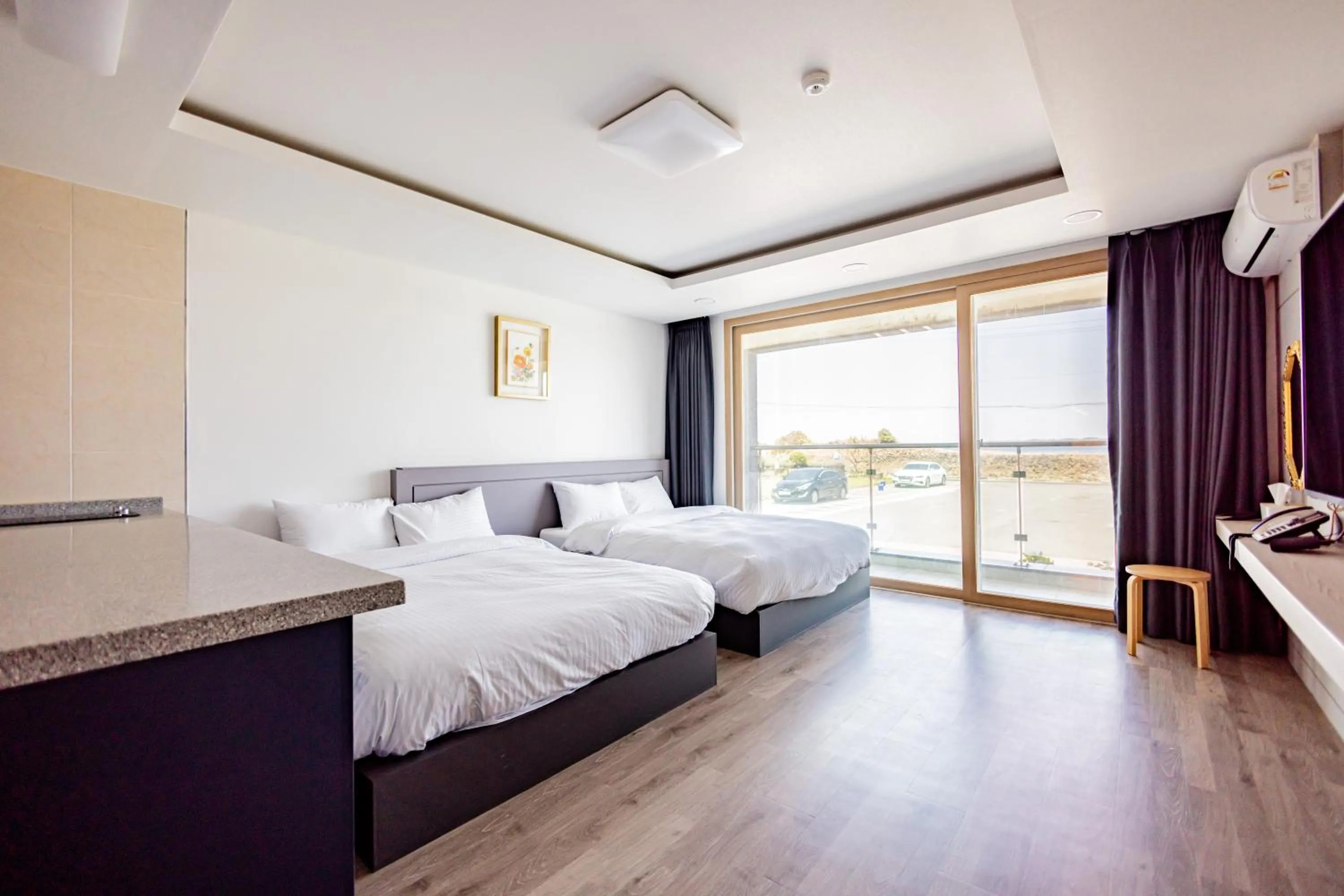 Bed in Jeju Arumdaun Resort