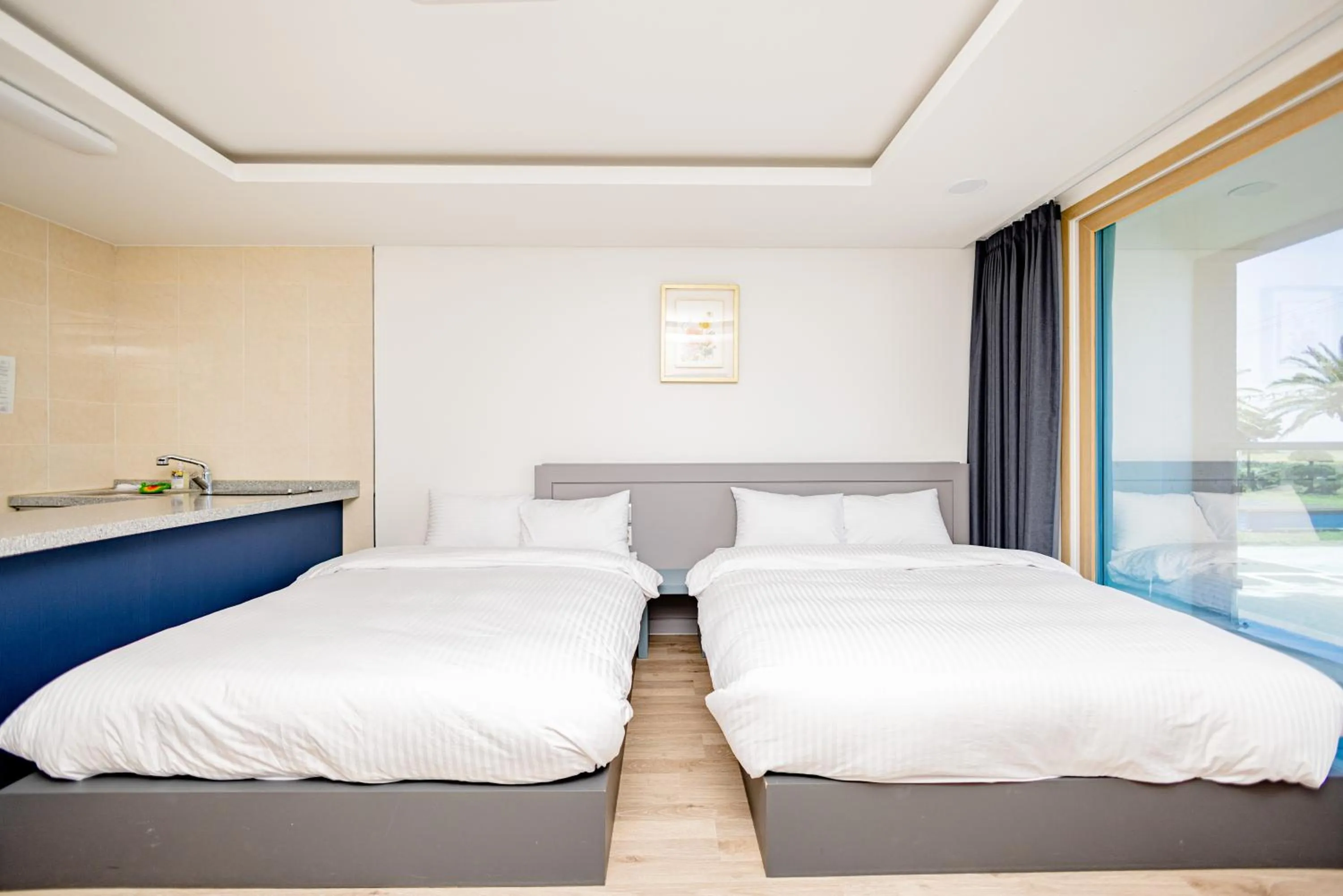 Bed in Jeju Arumdaun Resort