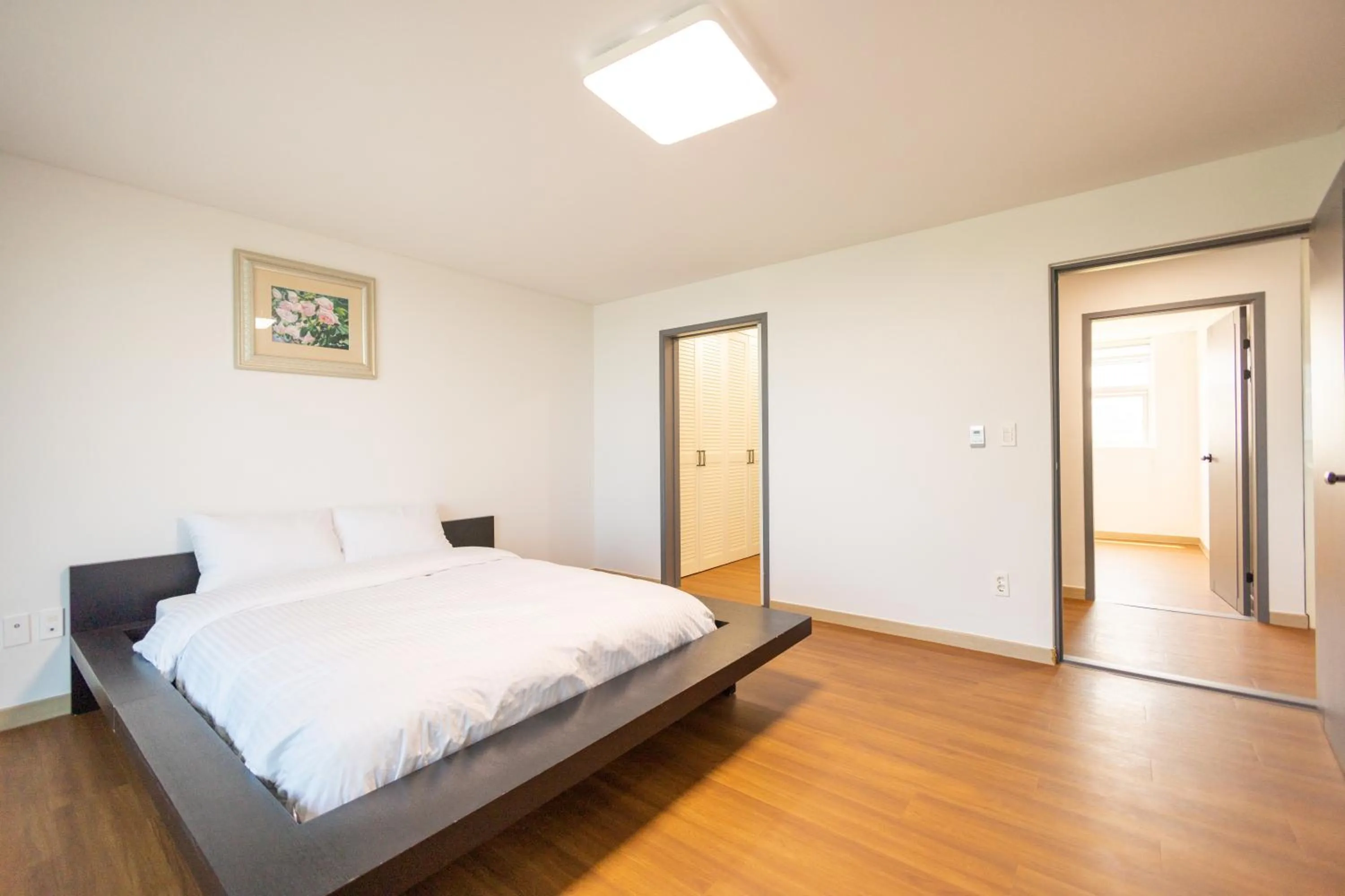 Bed in Jeju Arumdaun Resort