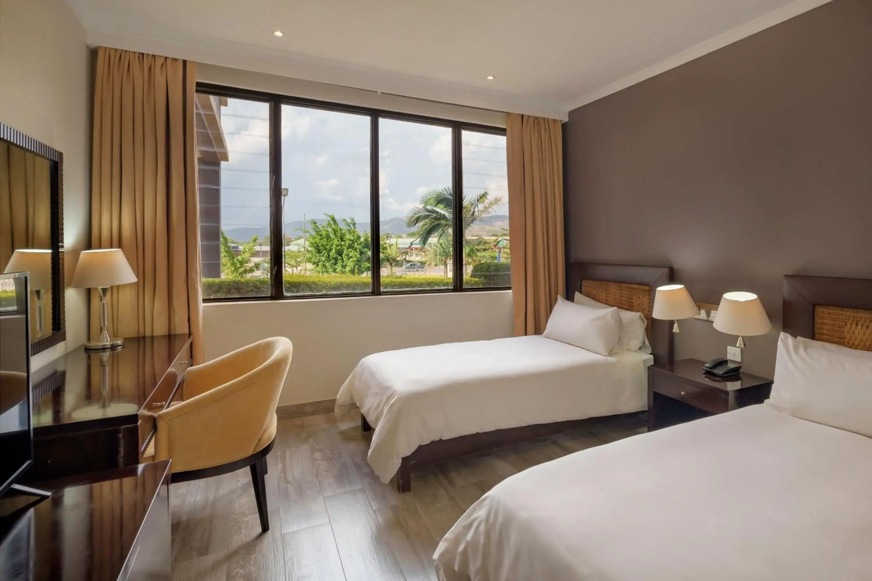 Guest Room with Twin Beds and Mountain View in Protea Hotel by Marriott Chipata Guest Room with Twin Beds and Mountain View in Protea Hotel by Marriott Chipata