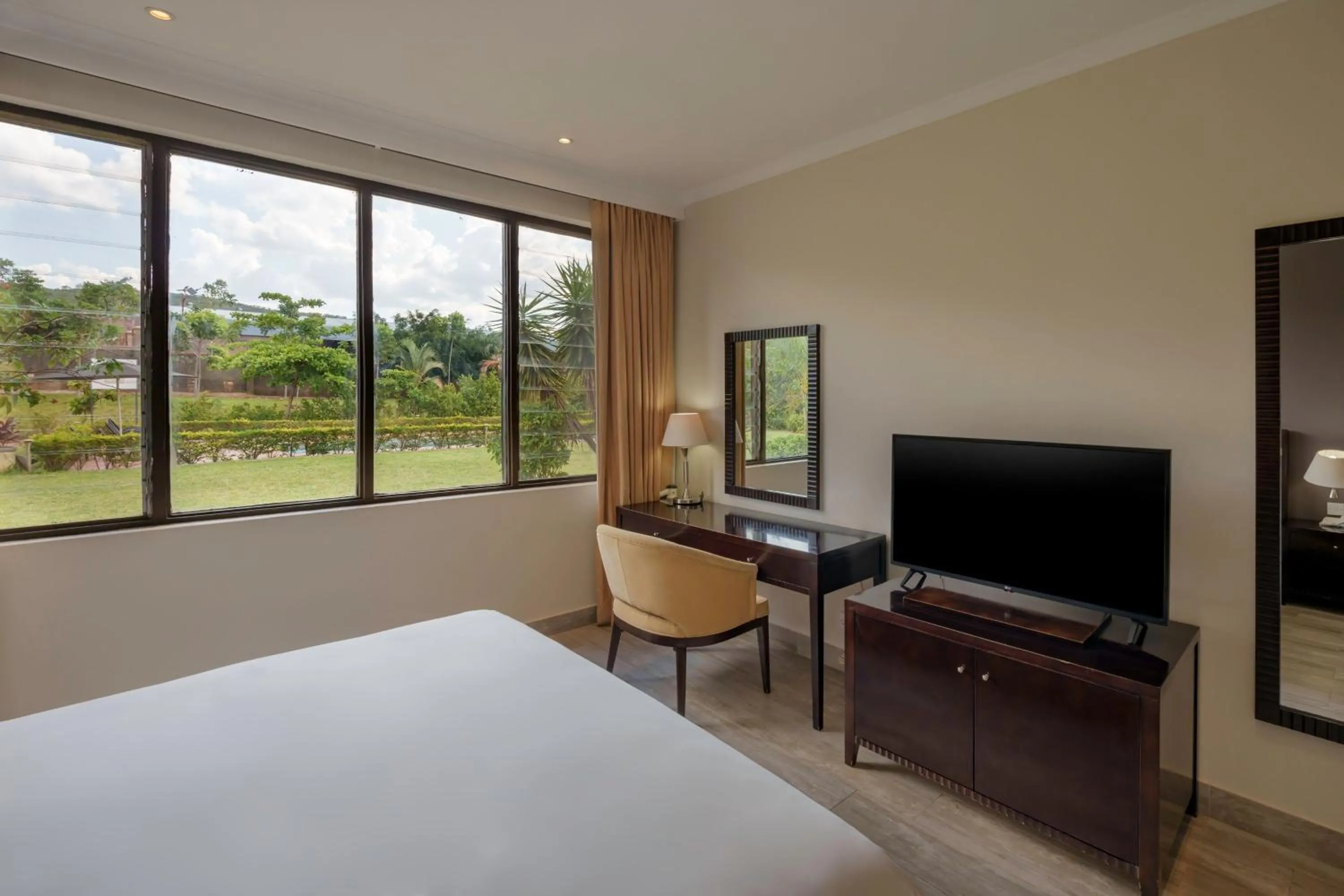 Photo of the whole room, Bed in Protea Hotel by Marriott Chipata