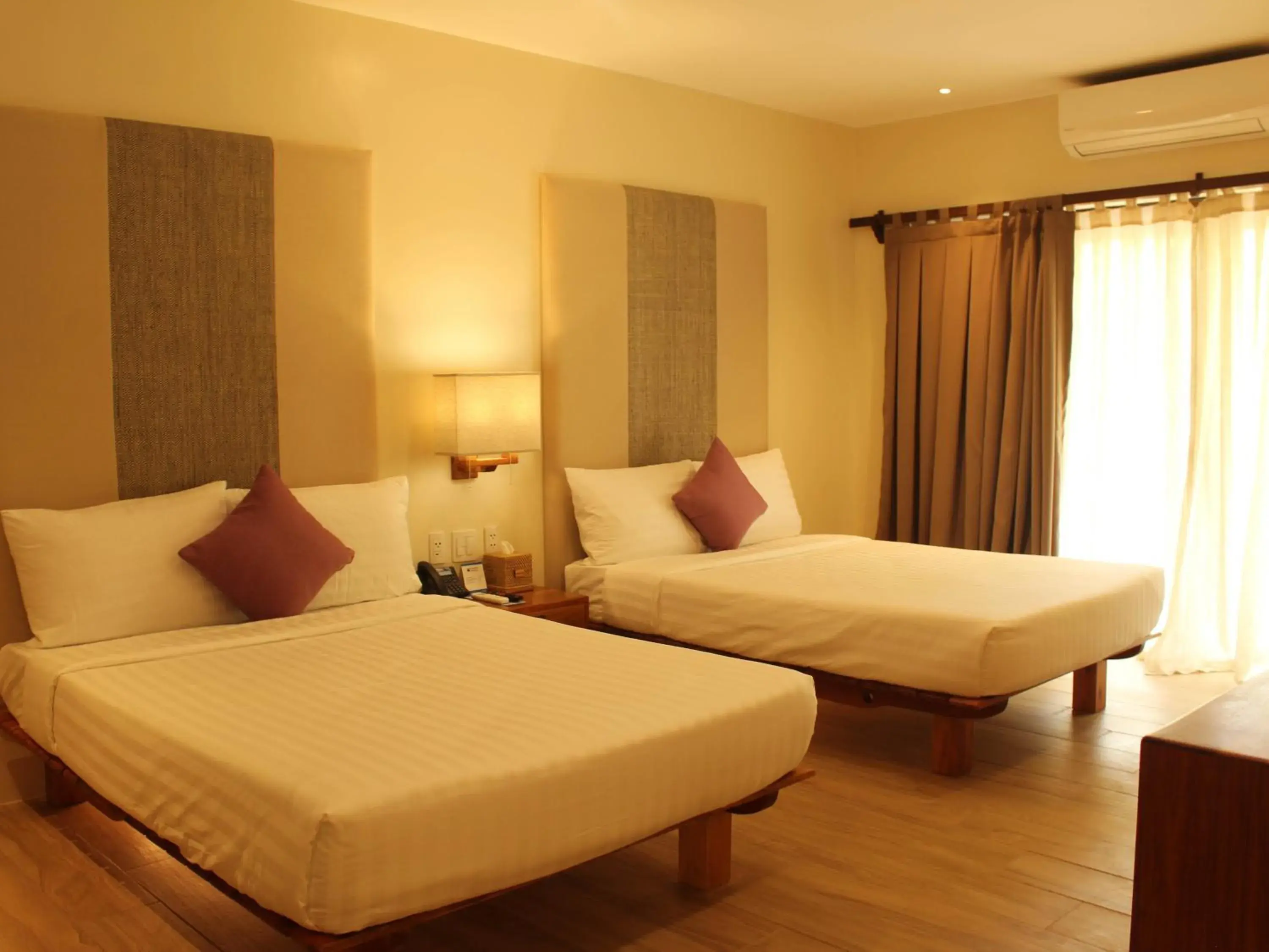 Bed in Bluewater Panglao Beach Resort Bed in Bluewater Panglao Beach Resort