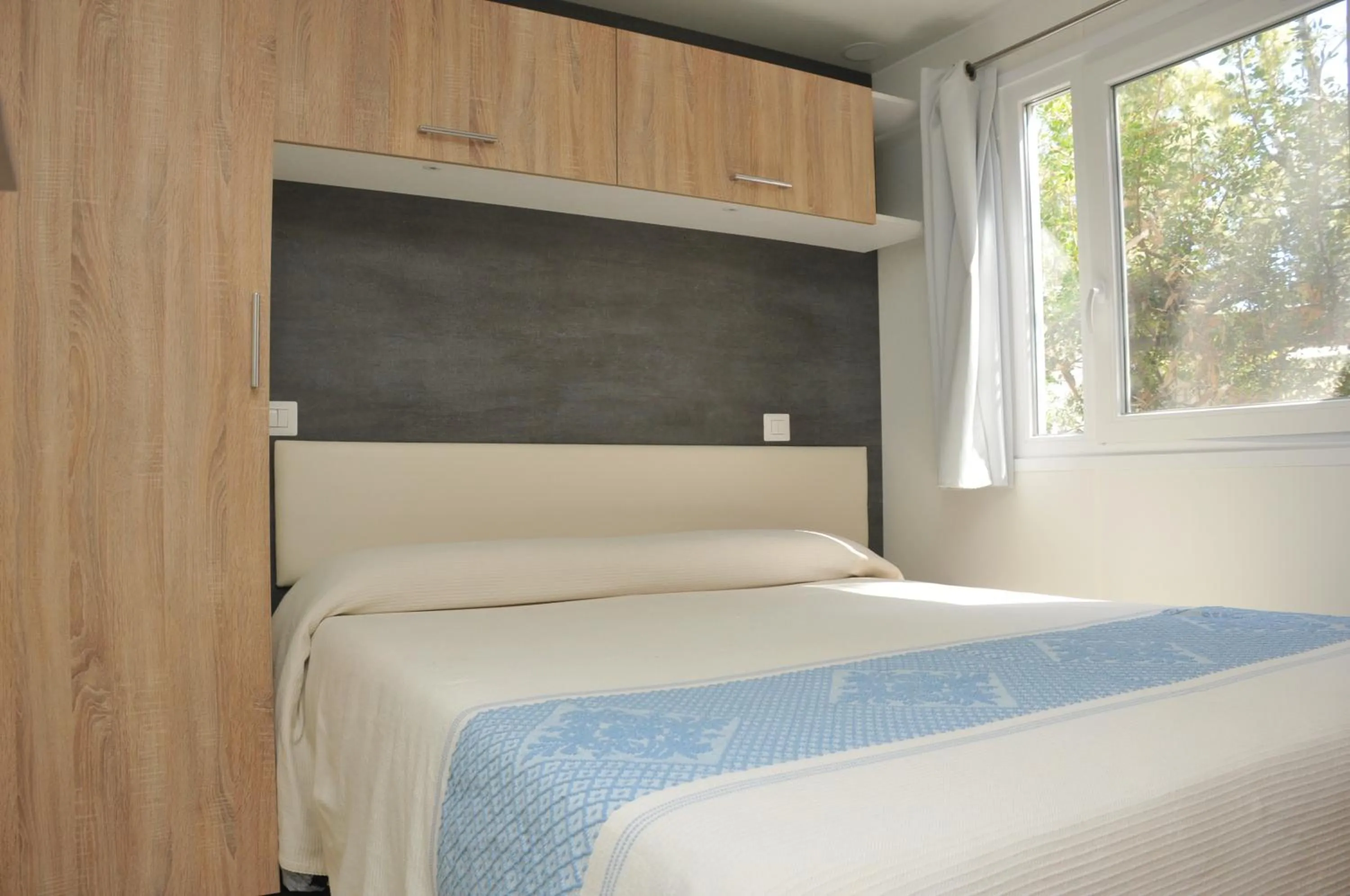 Bed in Villaggio Camping Torre Salinas