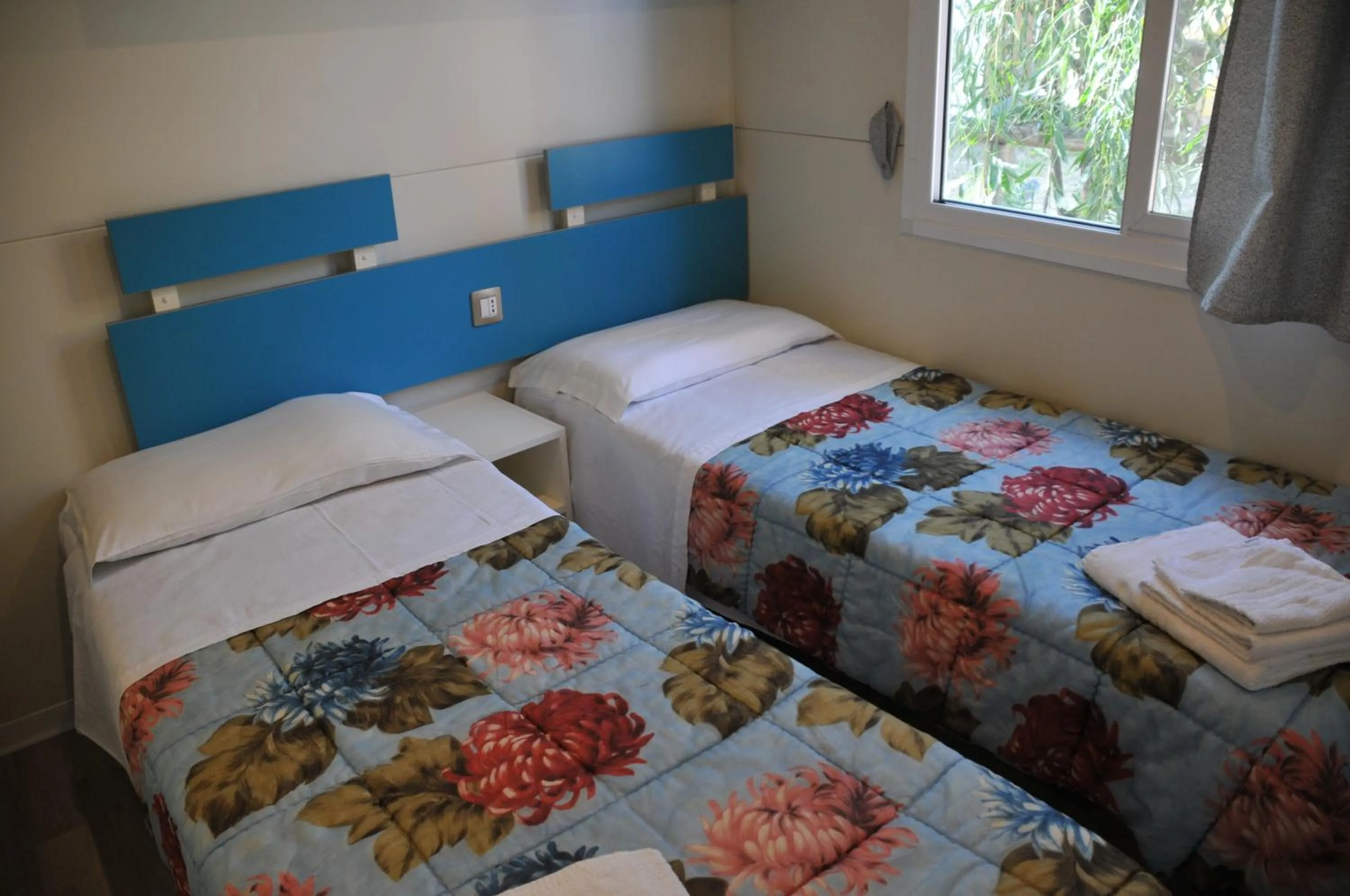 Bed in Villaggio Camping Torre Salinas