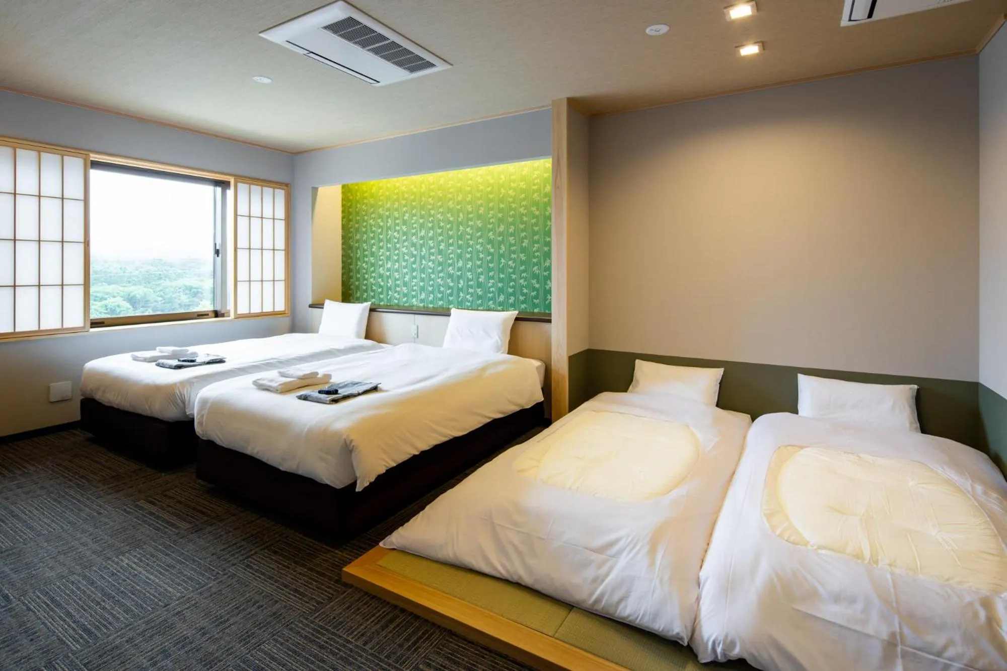 Bed in Fujikawaguchiko Resort Hotel