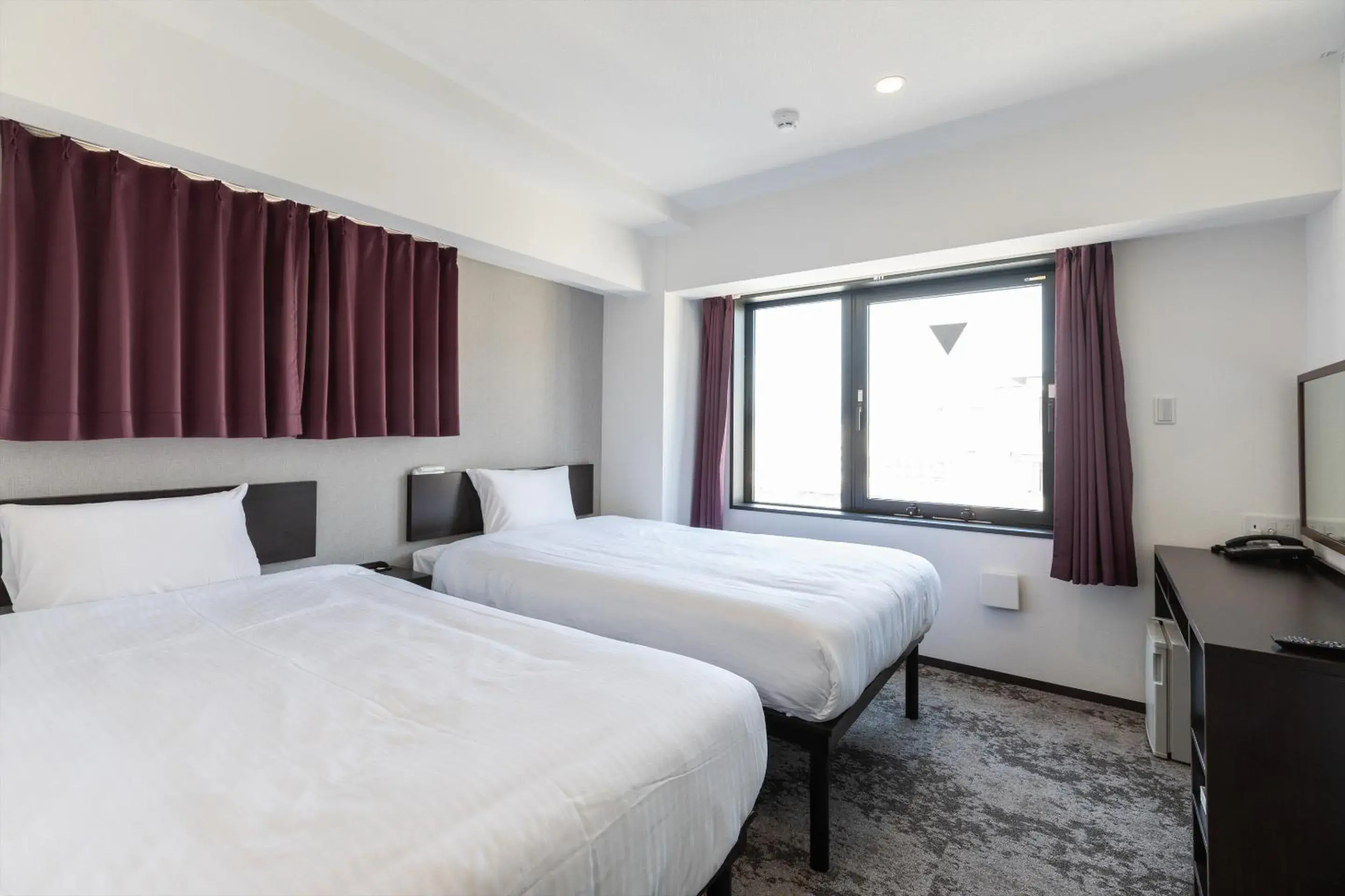 Bed in Hotel Tetora Kyoto Station Bed in Hotel Tetora Kyoto Station