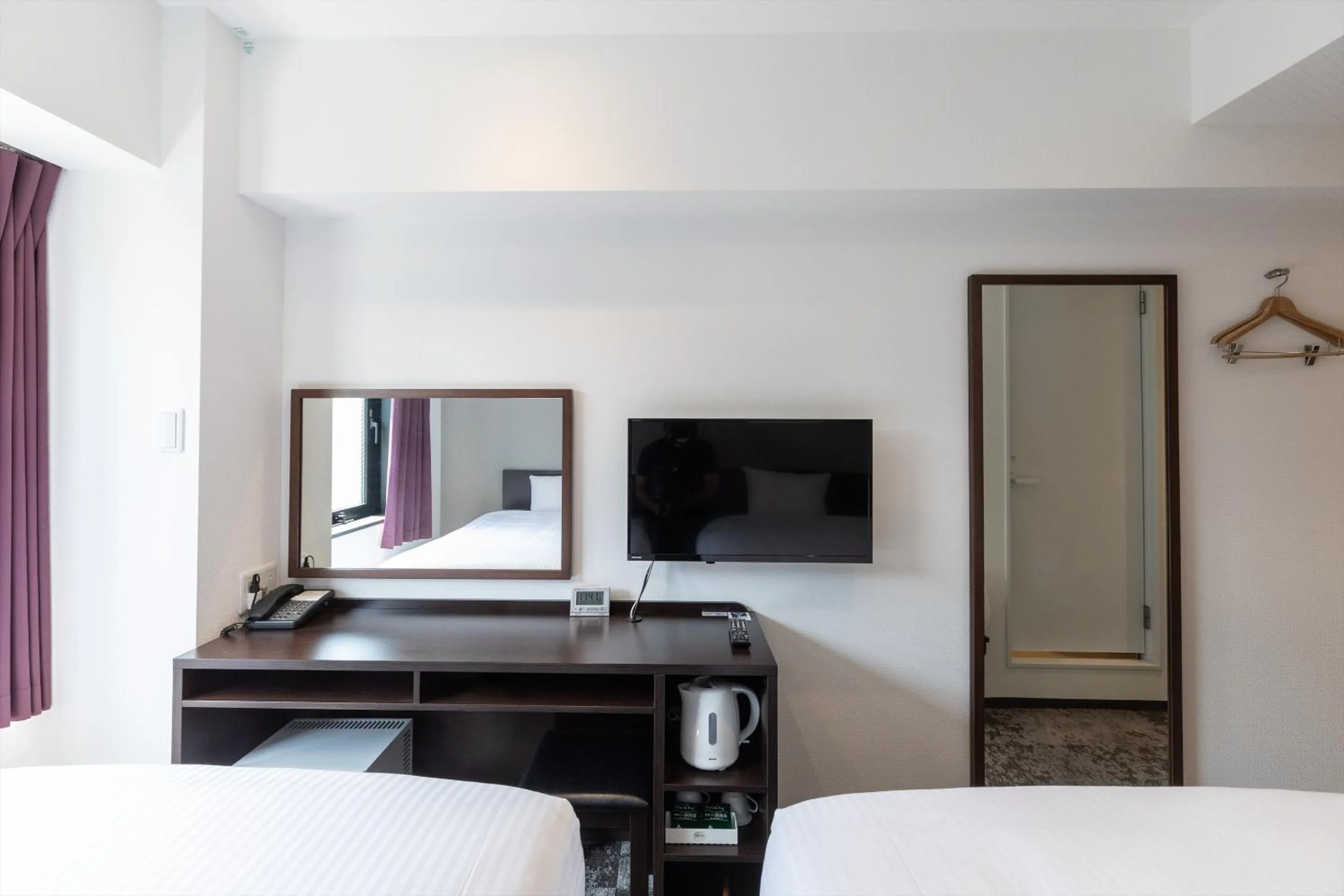 Bed in Hotel Tetora Kyoto Station