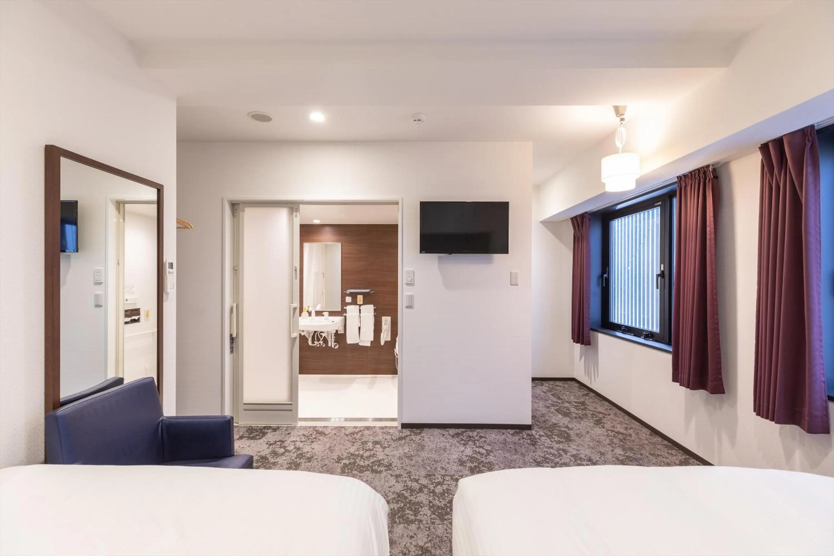 Bed in Hotel Tetora Kyoto Station