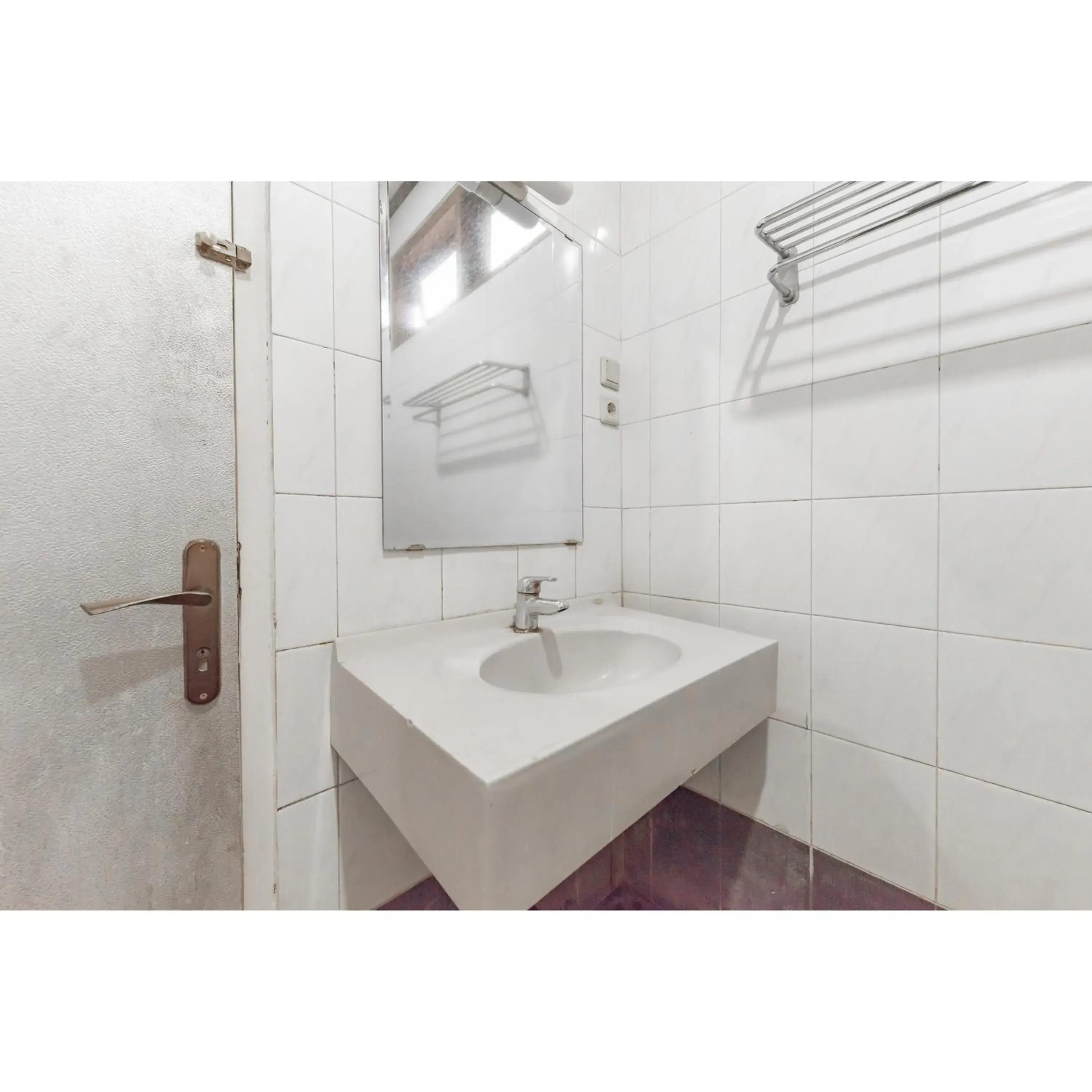 Bathroom in Urbanview Hotel Utari Bathroom in Urbanview Hotel Utari