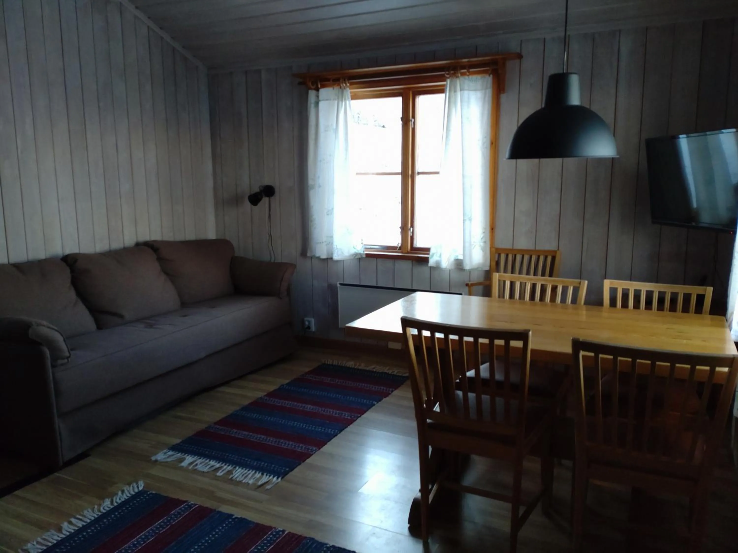 Living room in Fyrklöverns Stugby