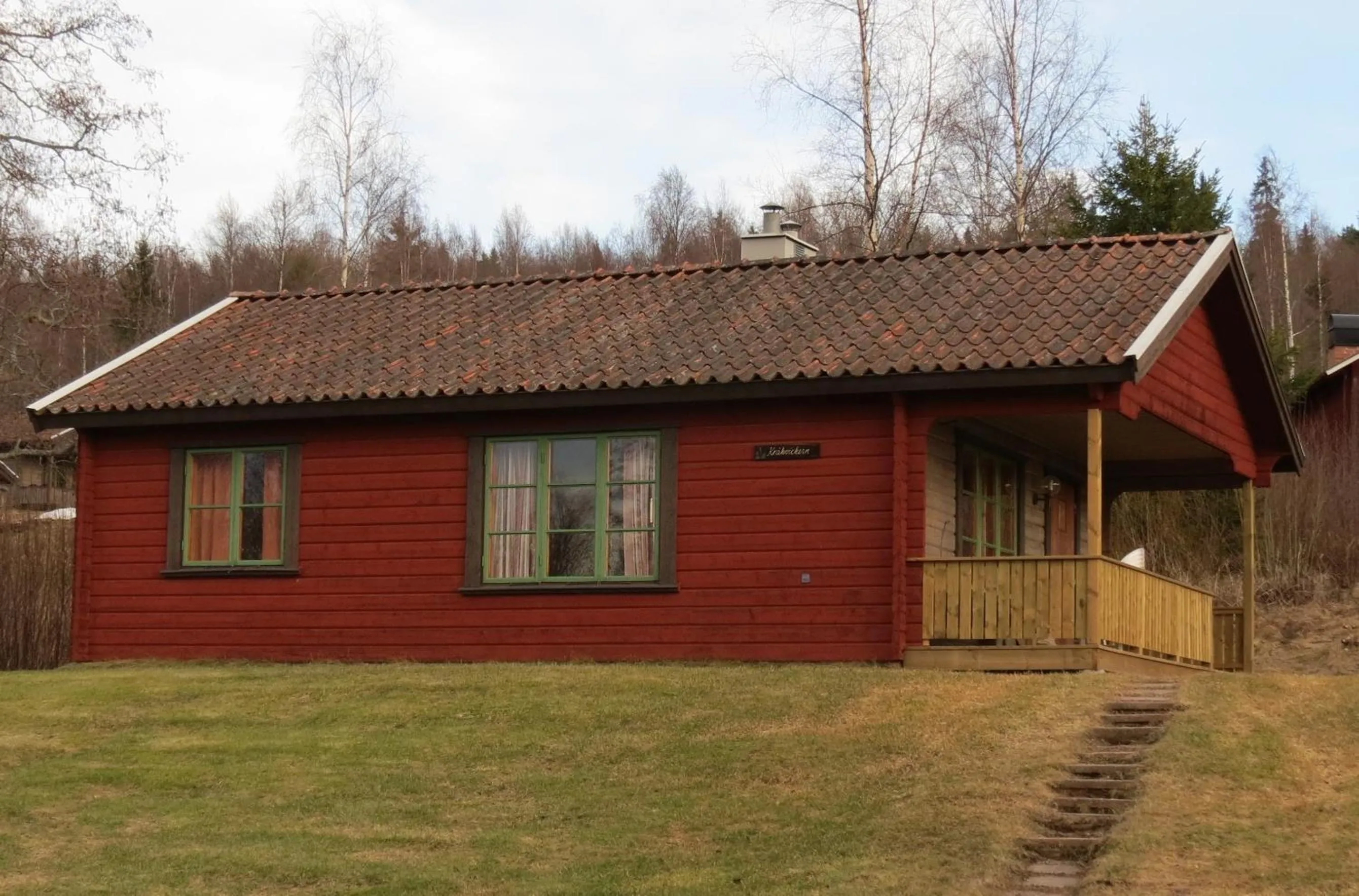 Facade/entrance in Fyrklöverns Stugby