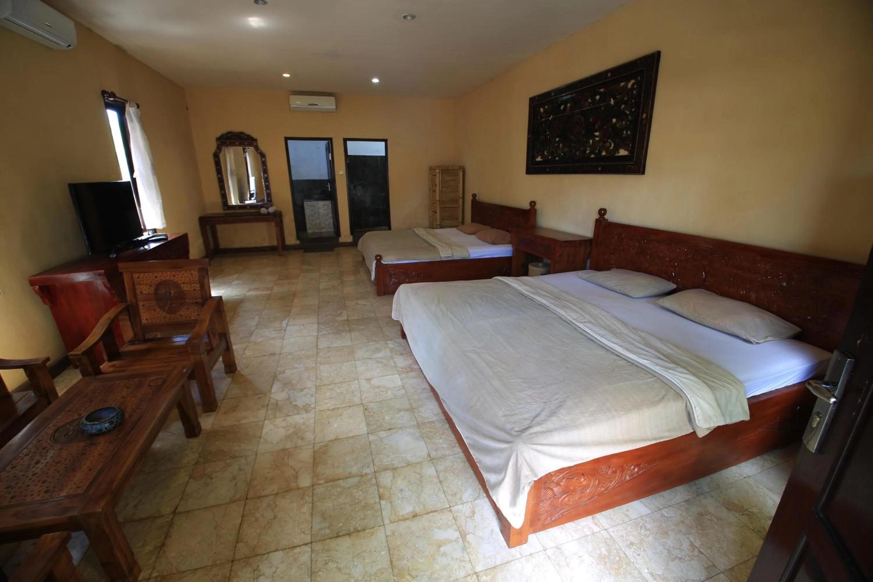 Bed in Bale Sasak Bungalow