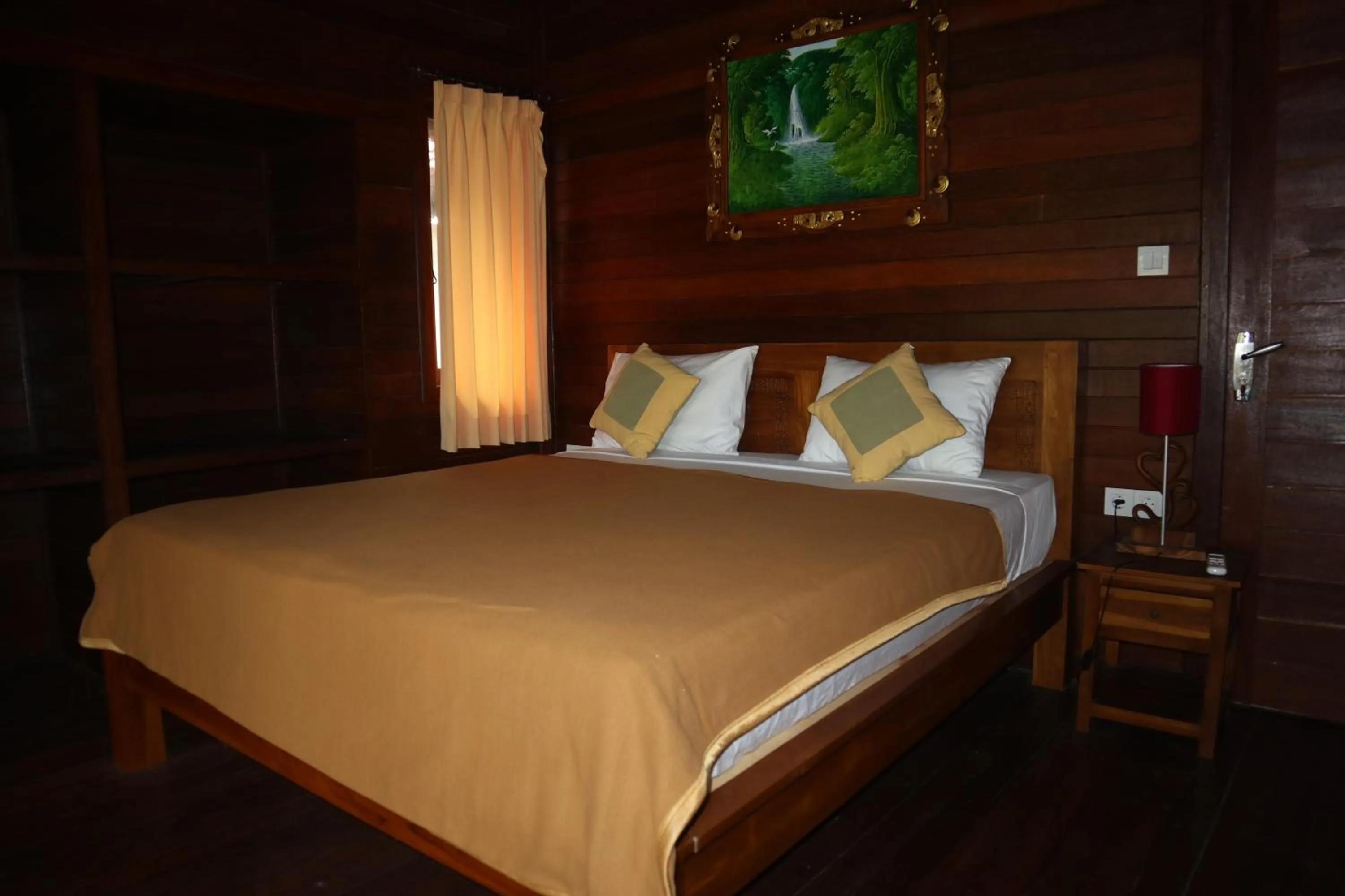 Bed in Svaha Nusa Guest House
