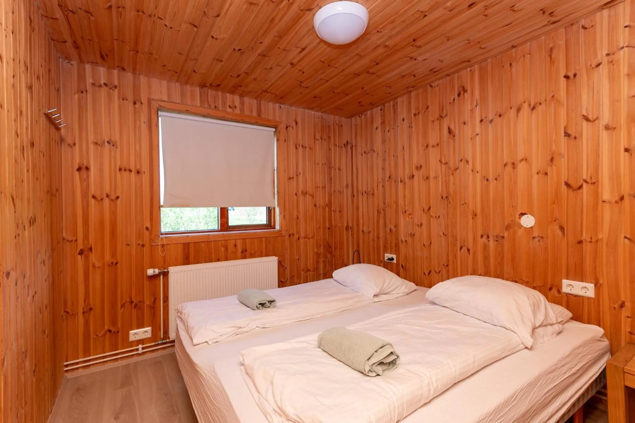 Living room, Bed in Gladheimar Cottages