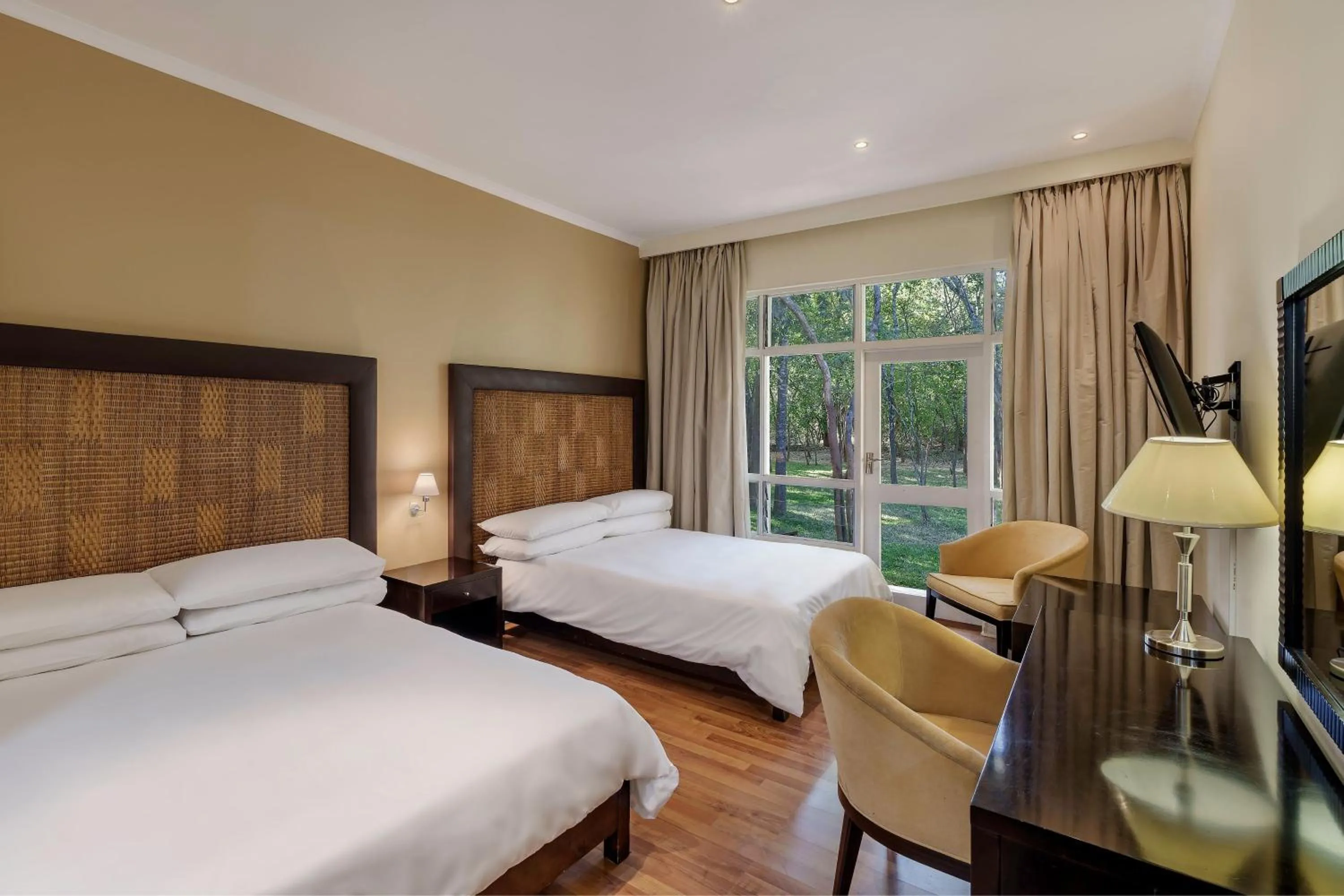 Photo of the whole room, Bed in Protea Hotel by Marriott Lusaka Safari Lodge
