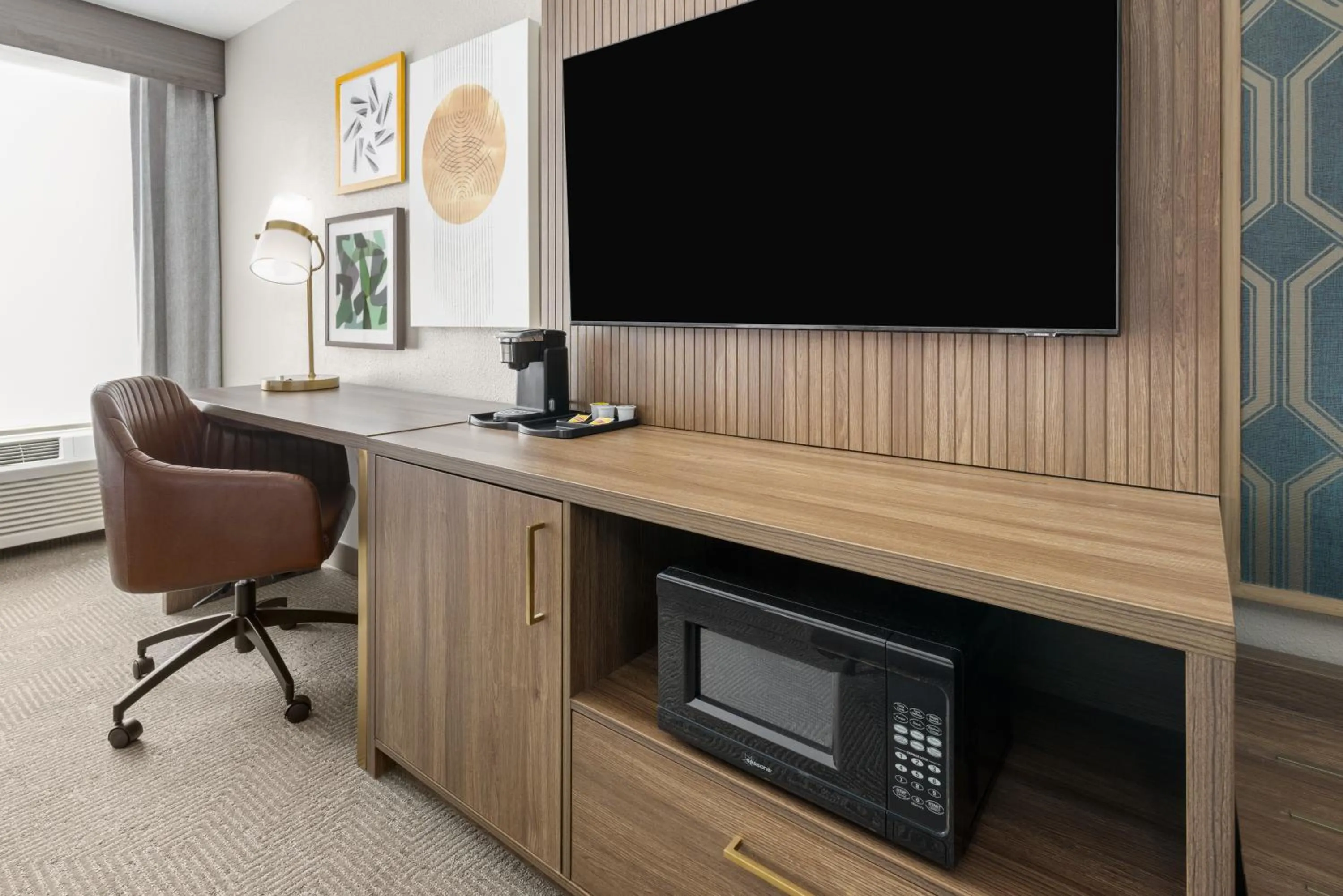TV and multimedia in Holiday Inn & Suites Columbia NE - Ft Jackson Area by IHG