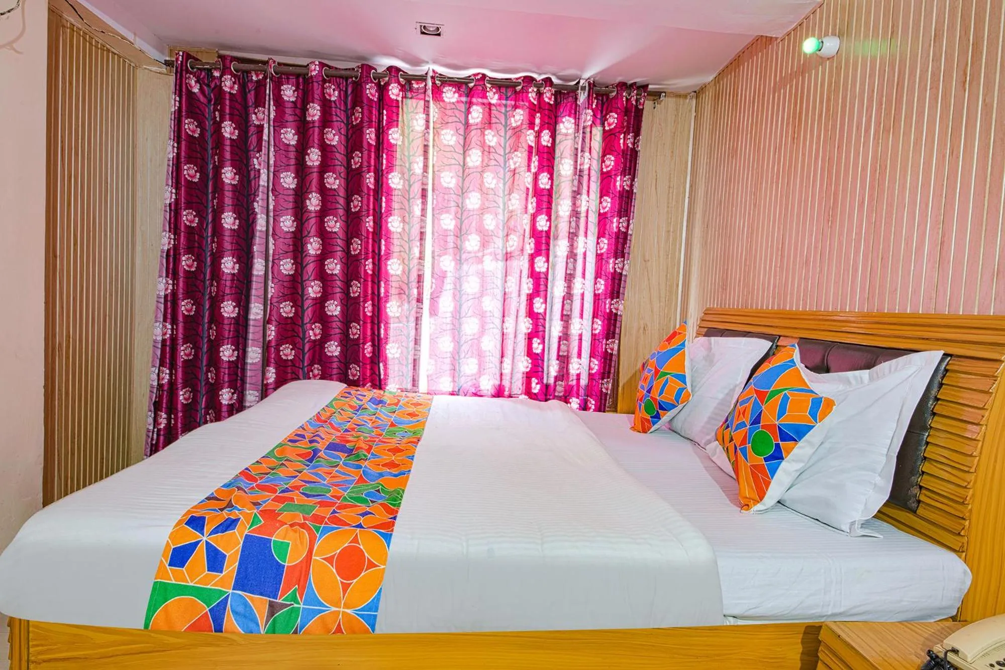 Bed in FabHotel Sapphire