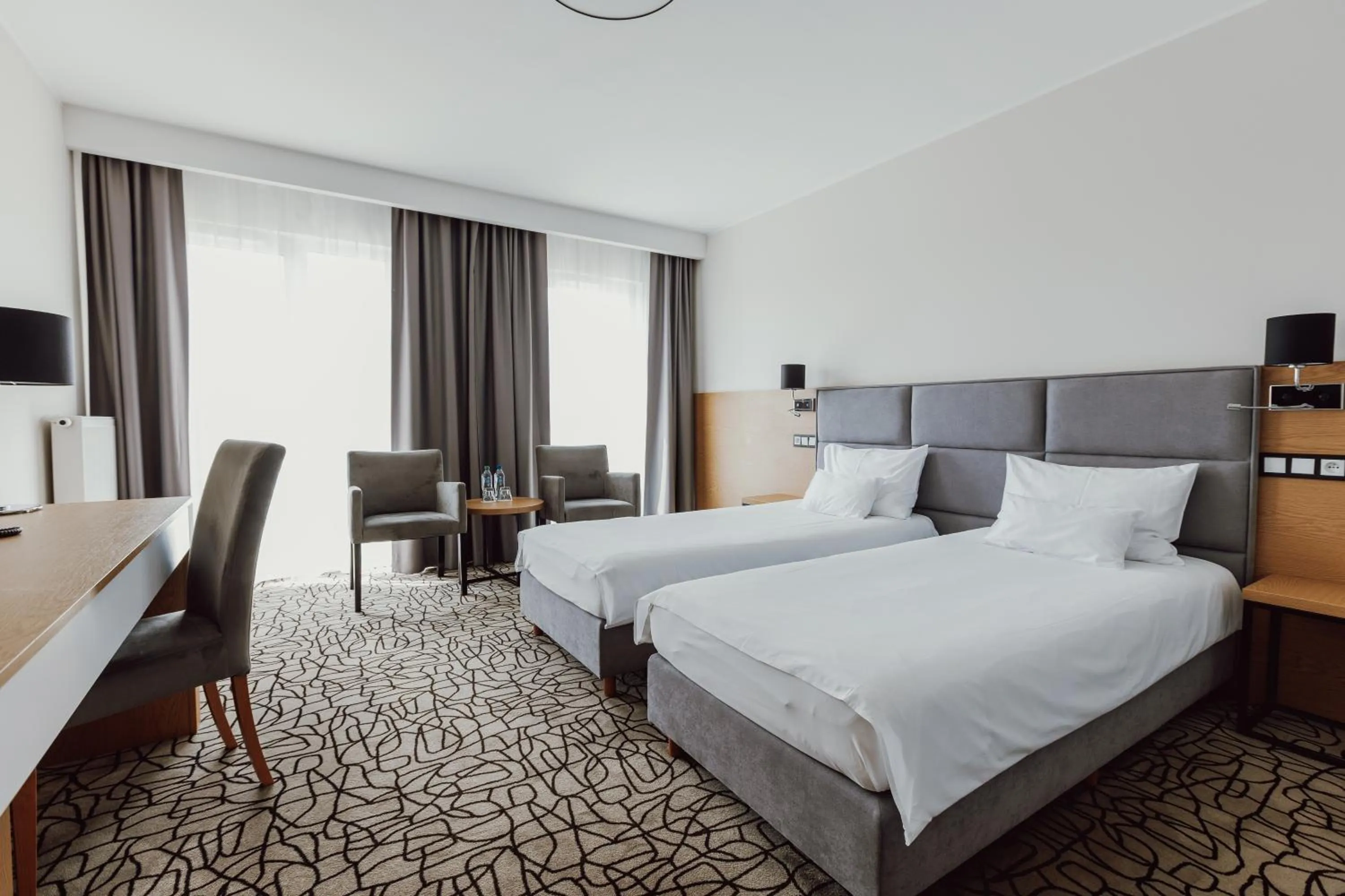 Communal lounge/ TV room, Bed in Aparthotel Termy Uniejów